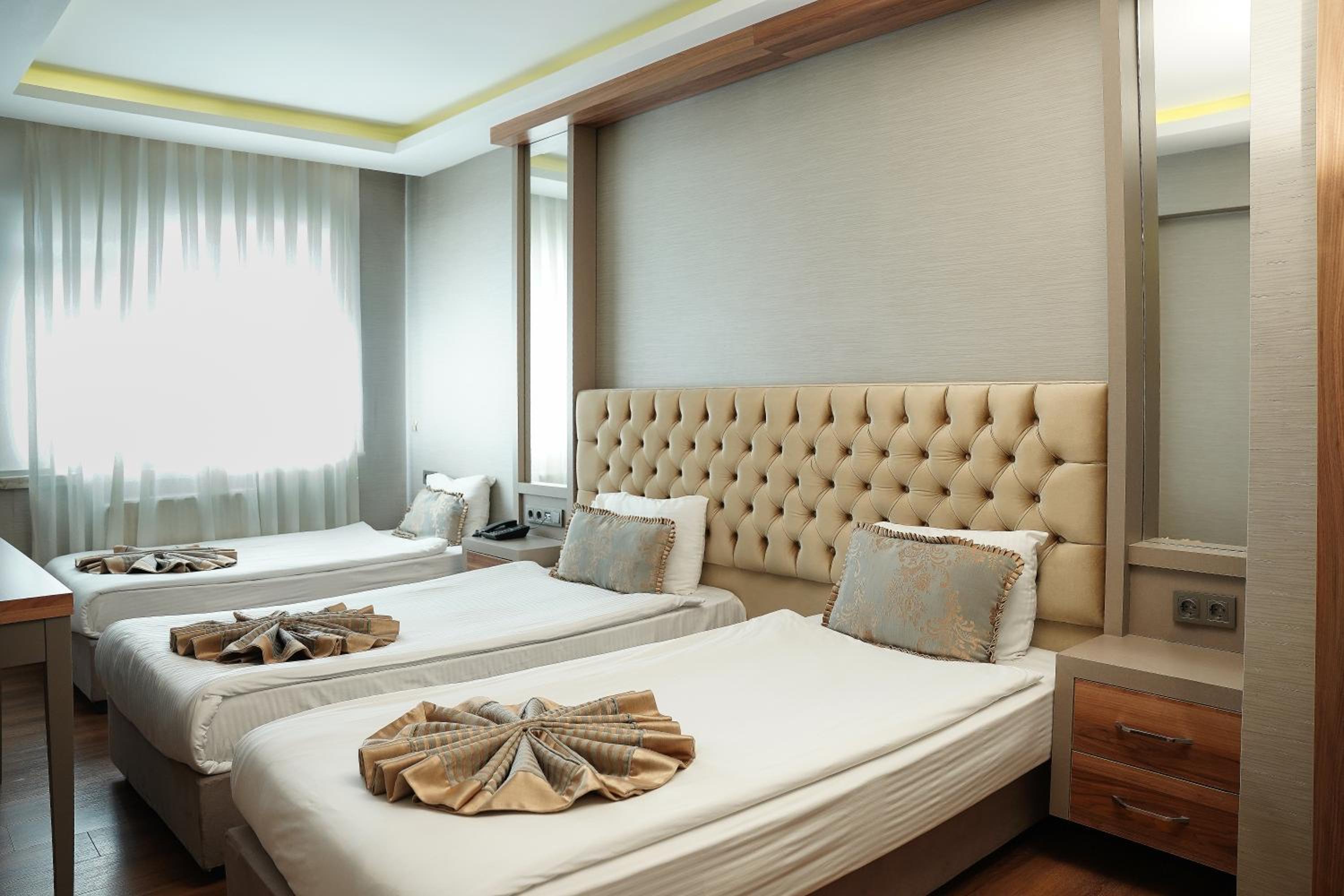 Basic Triple Room photo 2