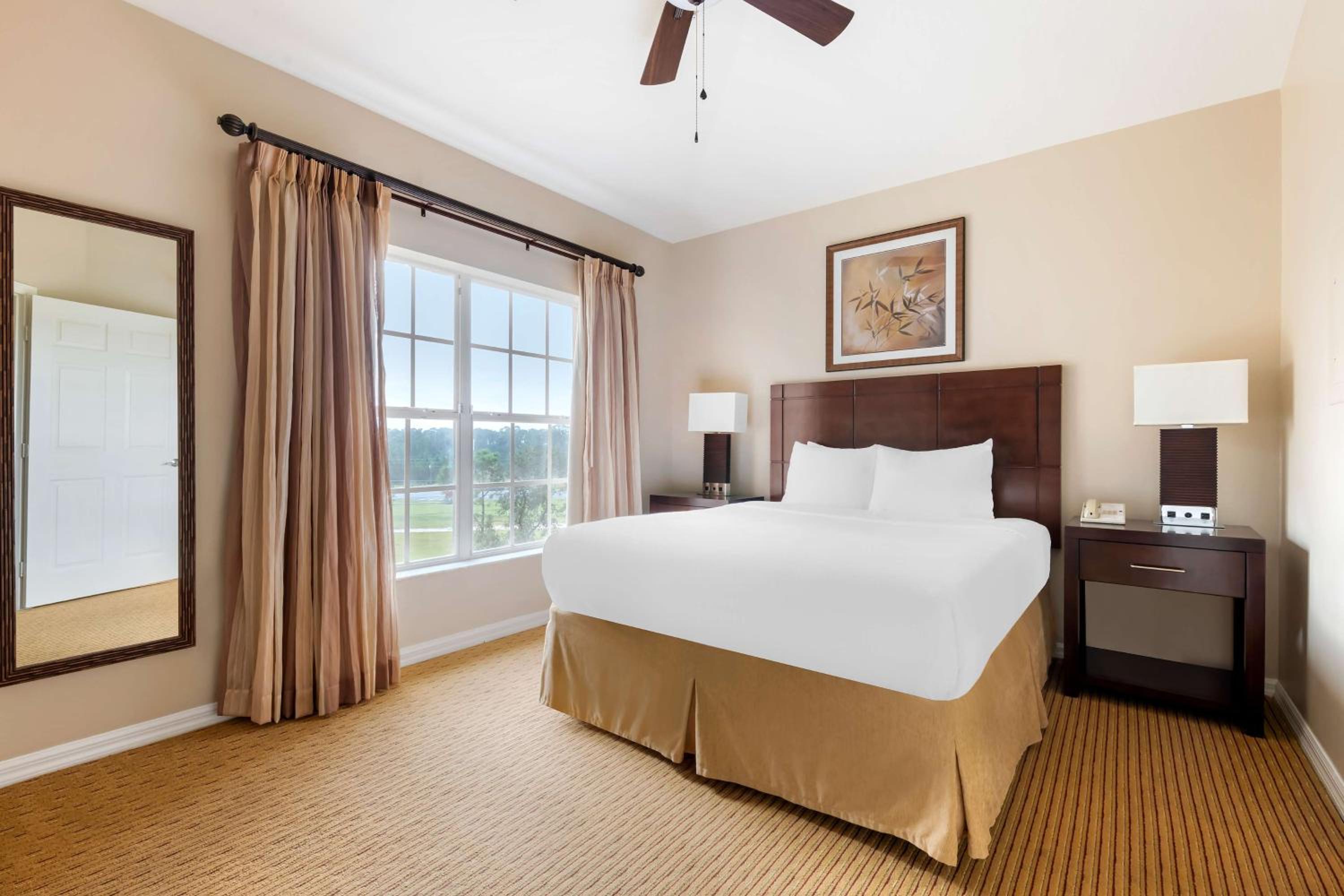 Two-Bedroom King Suite with Two Double Beds and Roll-In Shower - Hearing Accessible