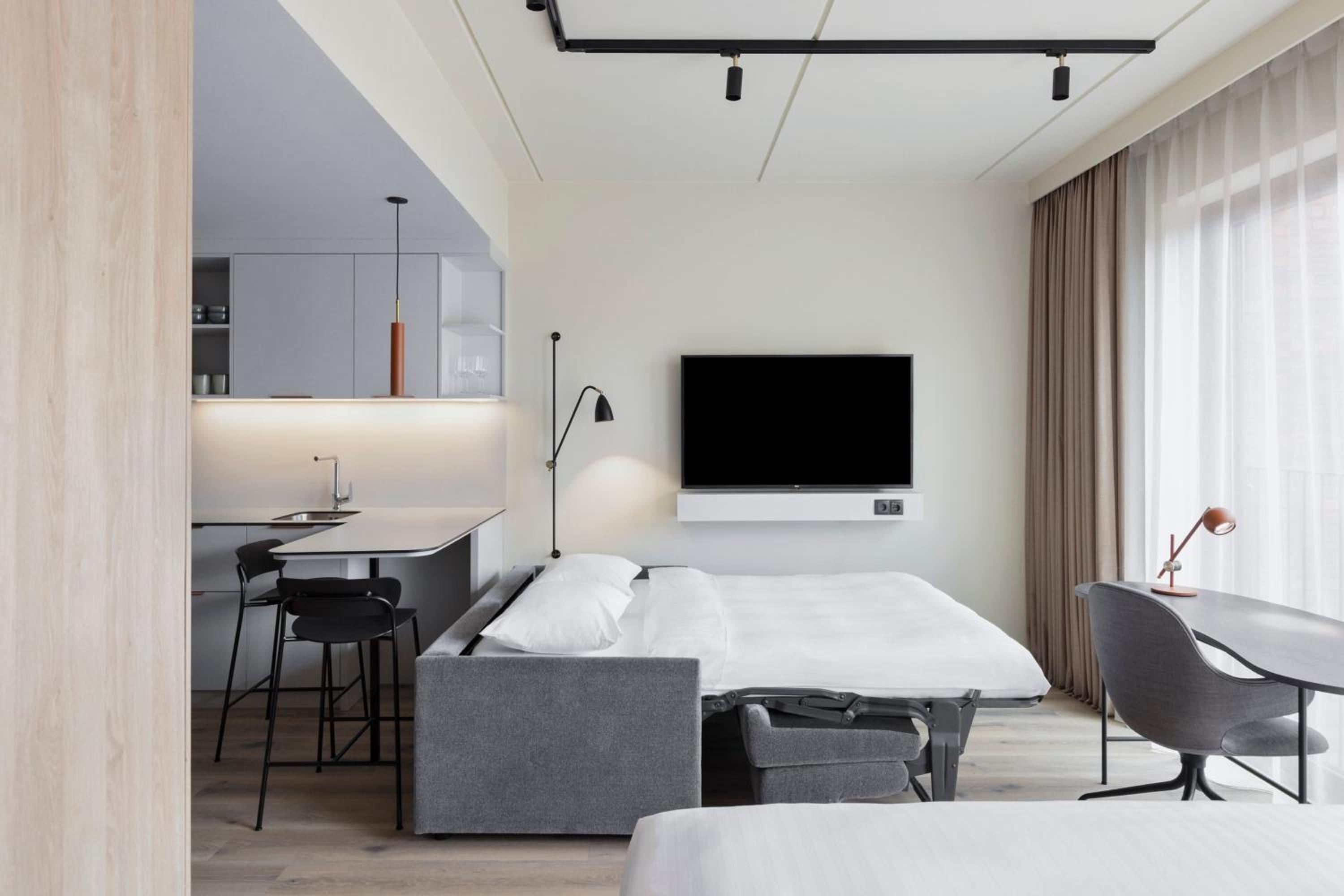 Family Studio with Sofa Bed and Courtyard View - Photo 3