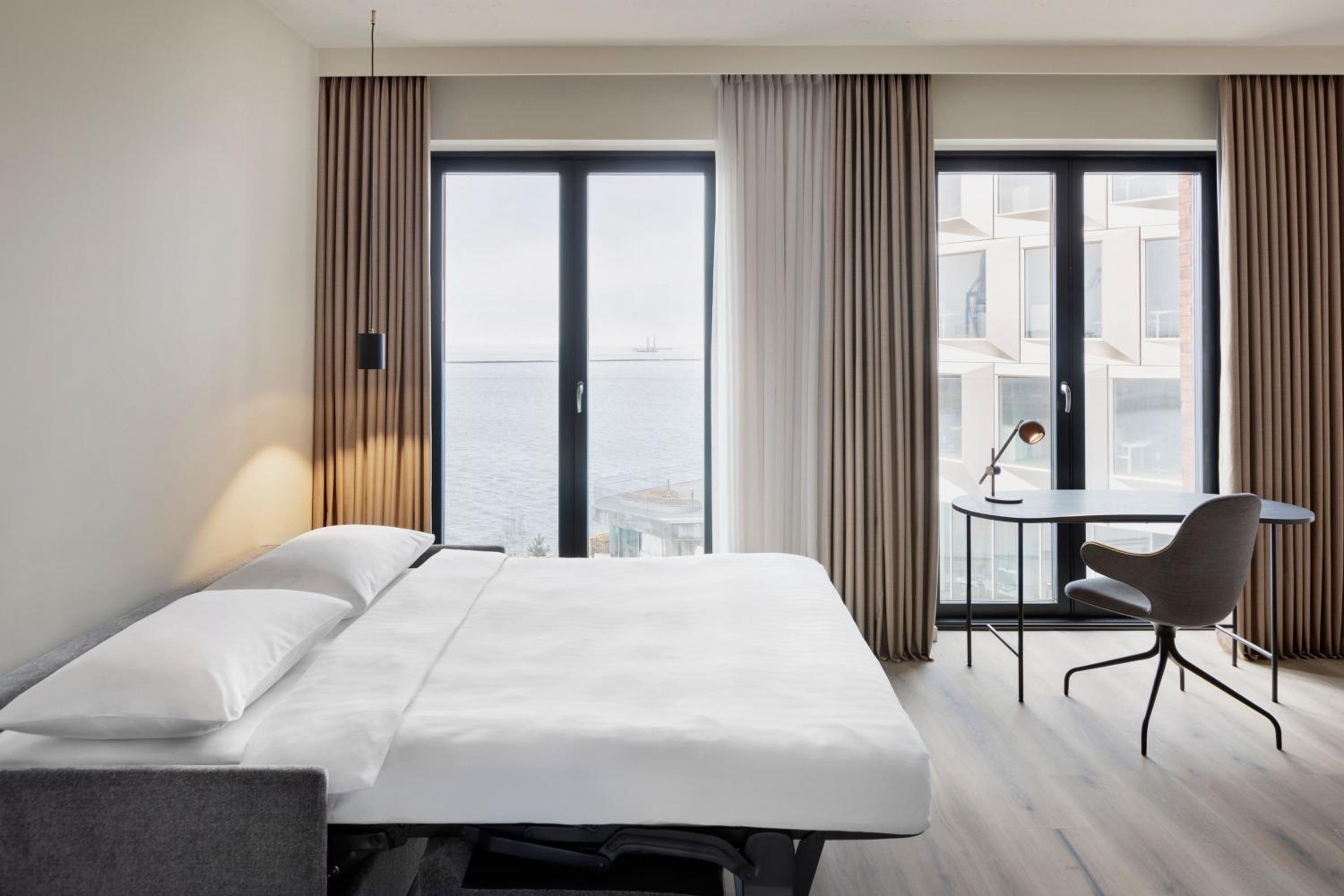 Family Studio with Sofa Bed and Courtyard View - Photo 13