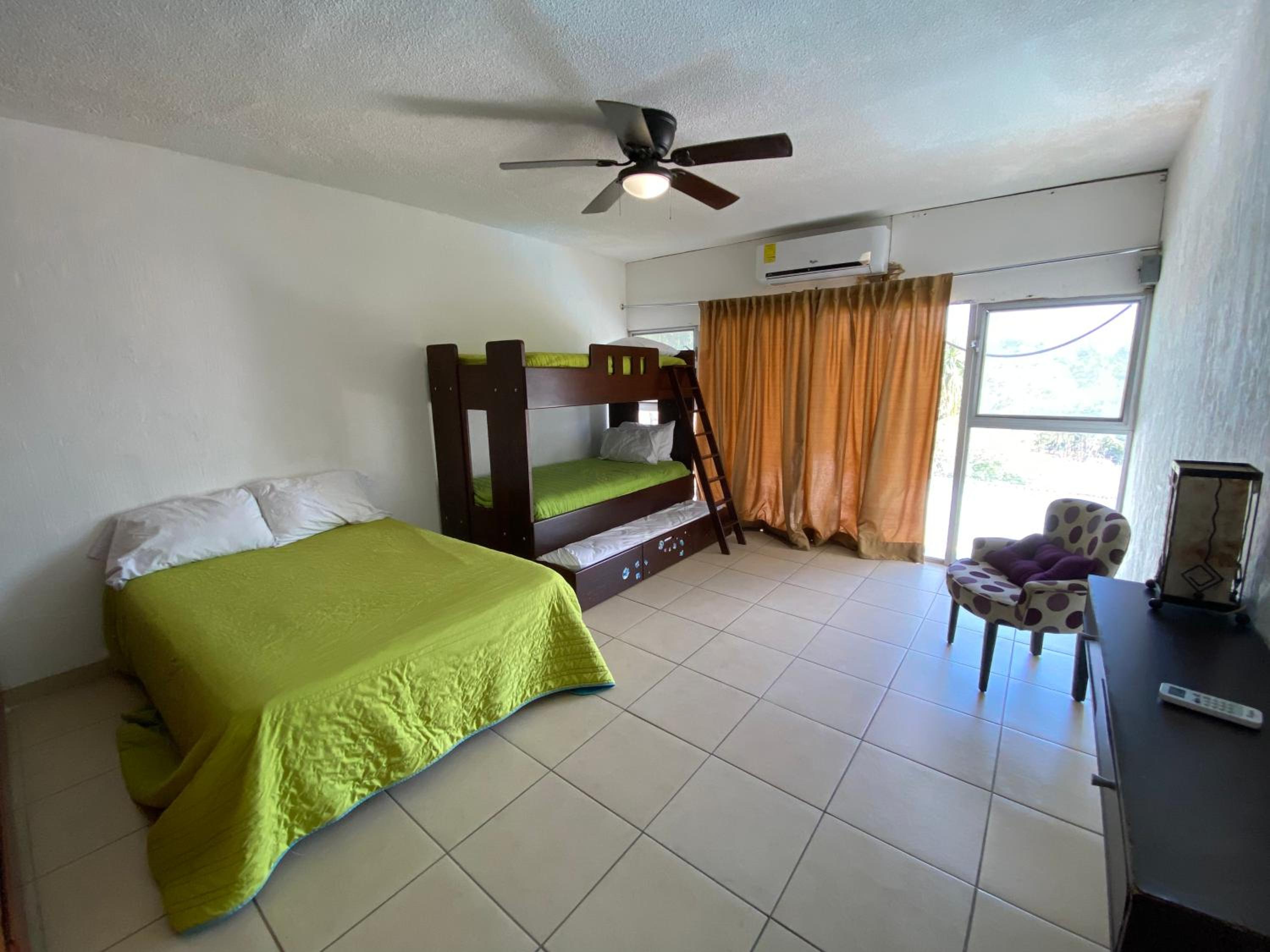 Four-Bedroom House - Photo 37