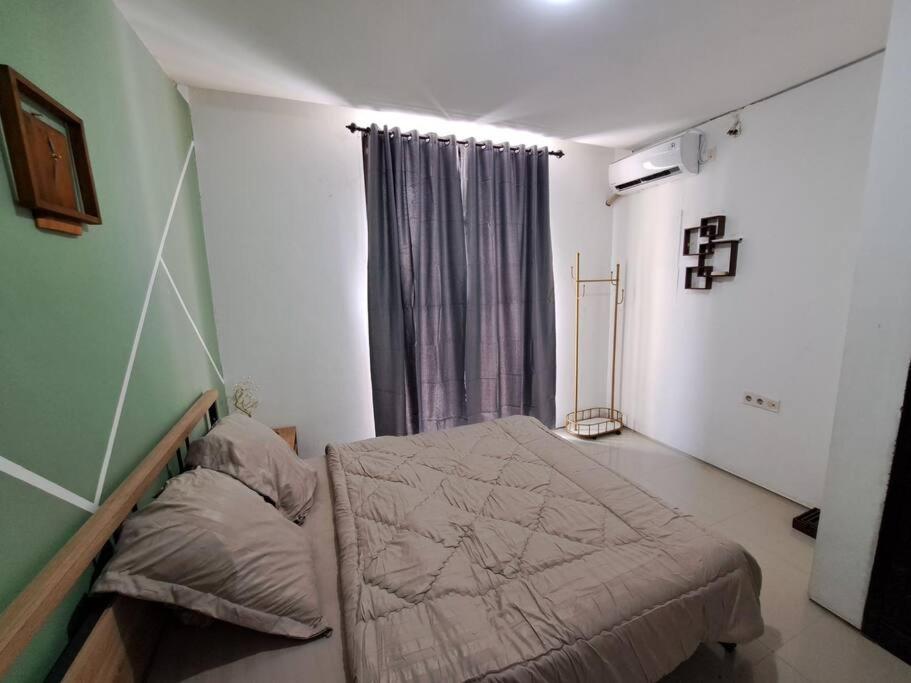Three-Bedroom House photo 1