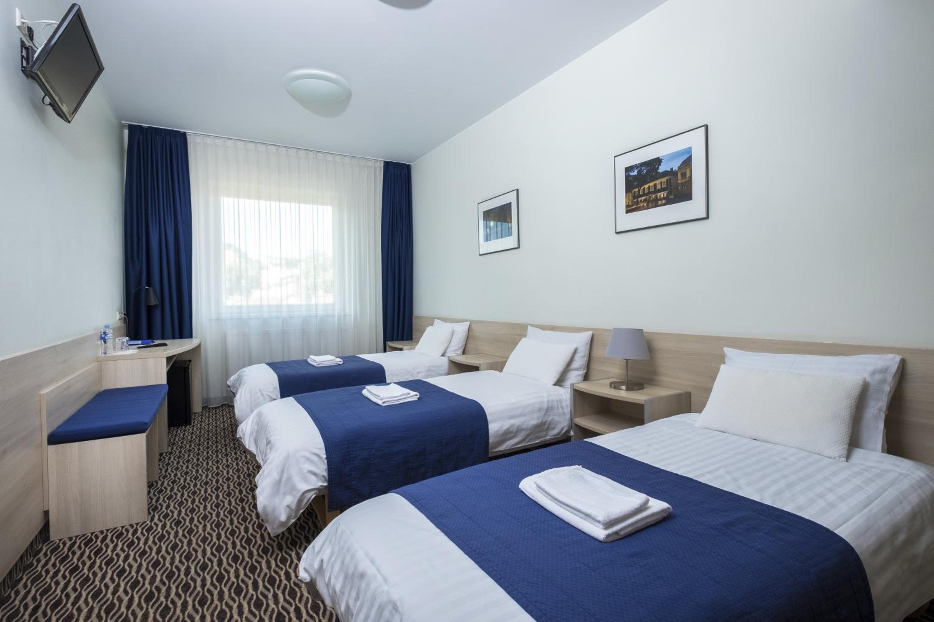 Triple Room - Photo 1