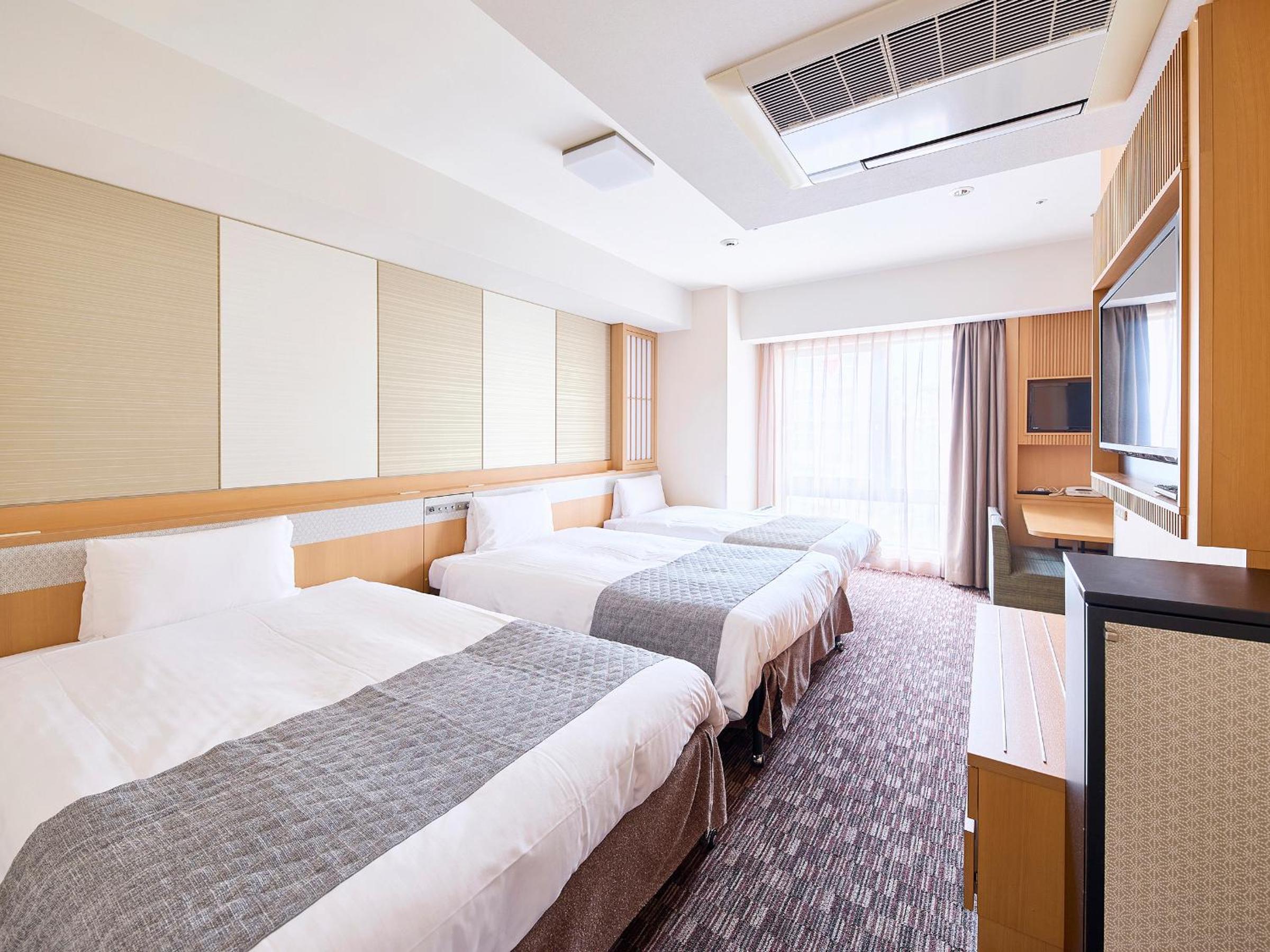 Deluxe Quadruple Room - Non-Smoking - Photo 5