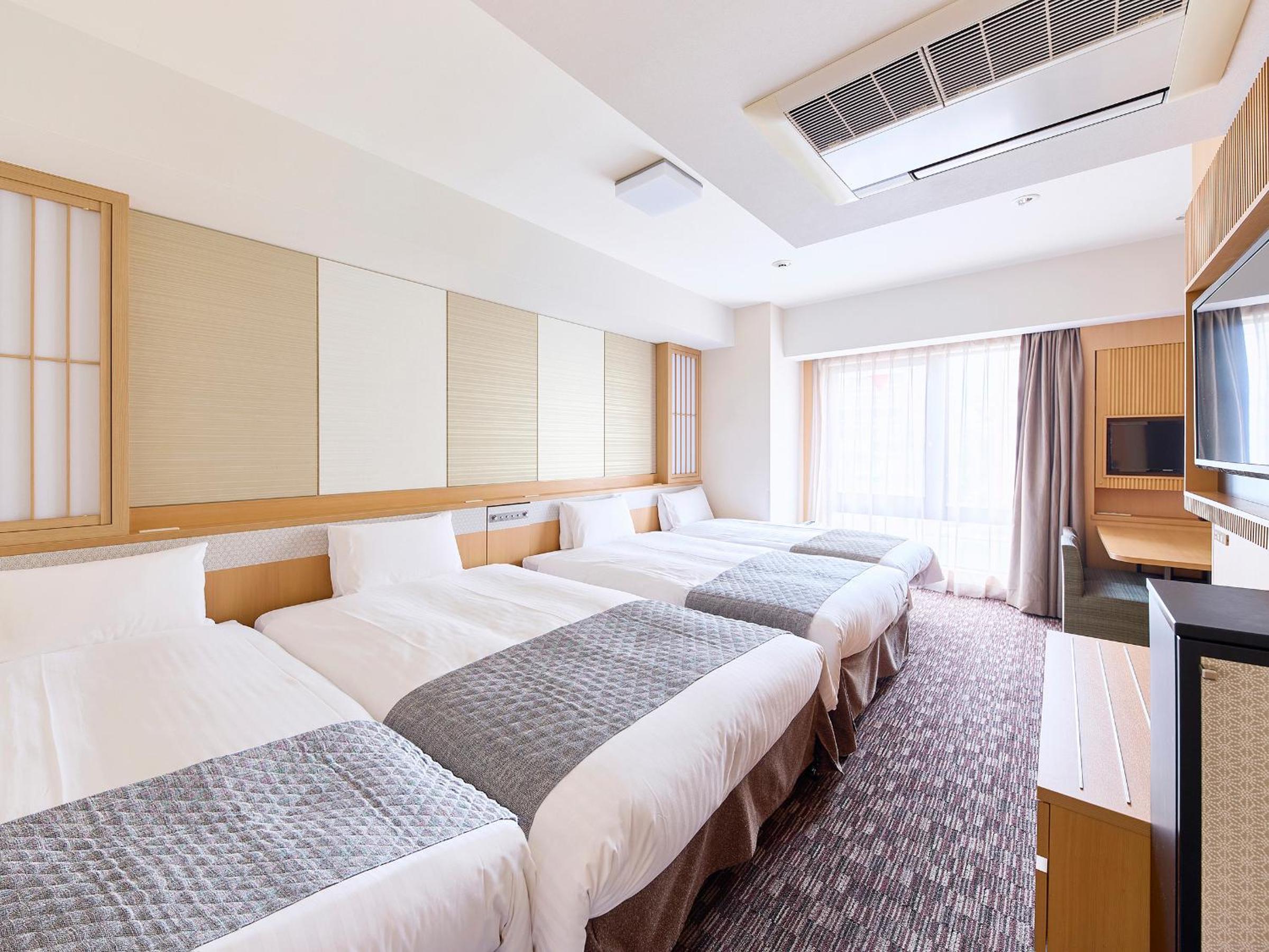 Deluxe Quadruple Room - Non-Smoking - Photo 4