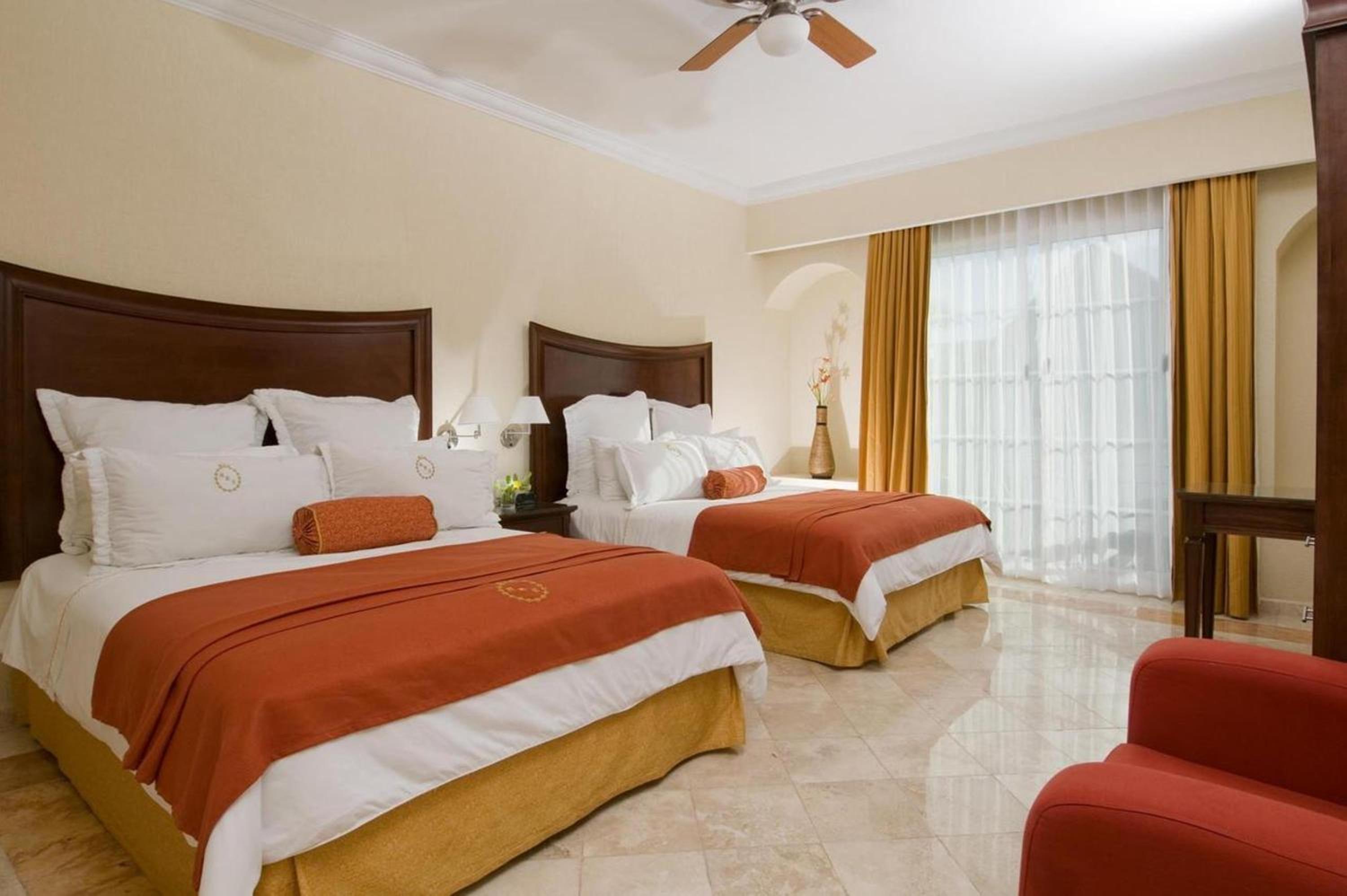 Queen Room with Two Queen Beds - Photo 1
