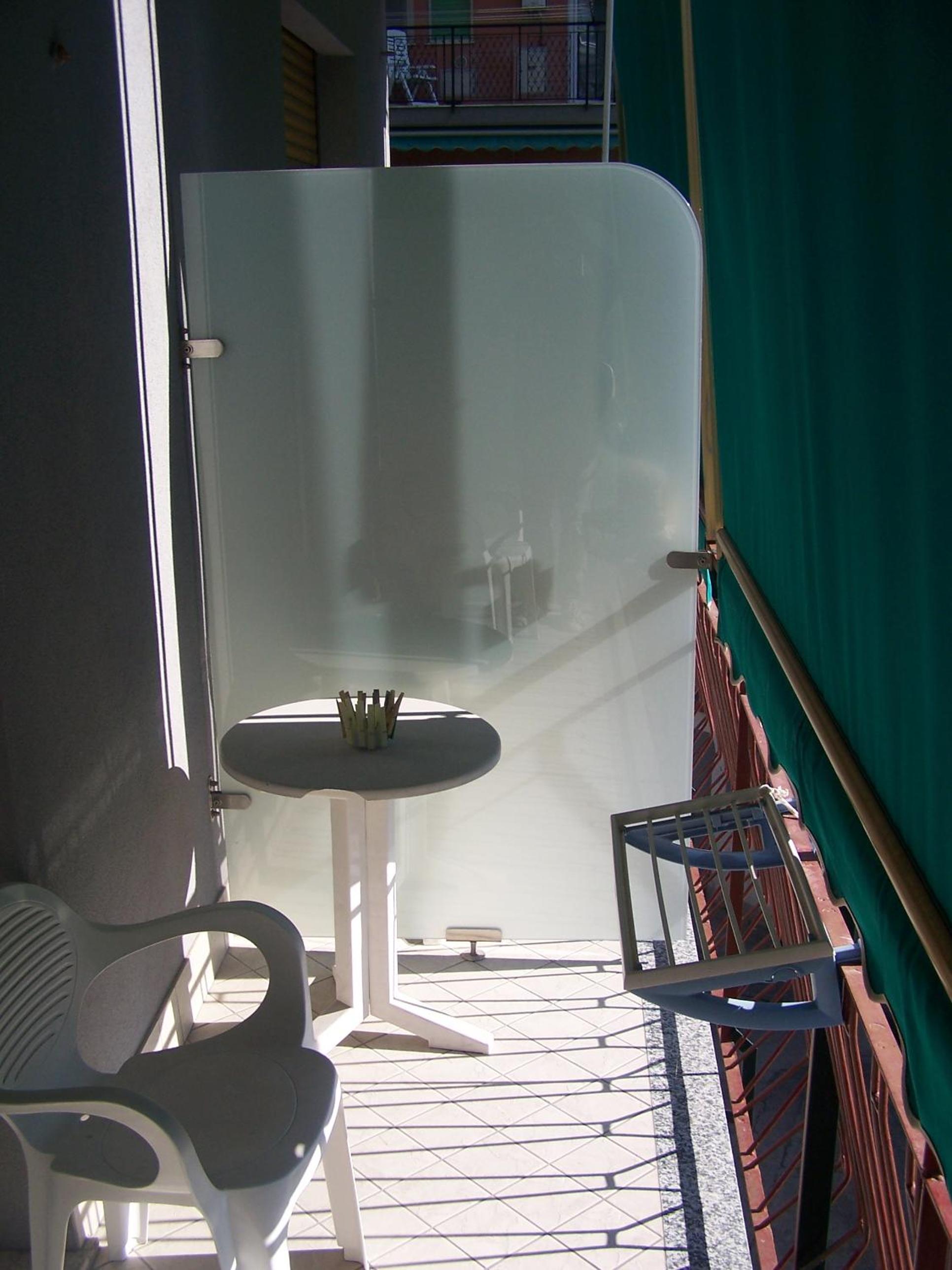Quadruple Room with Balcony - Photo 2