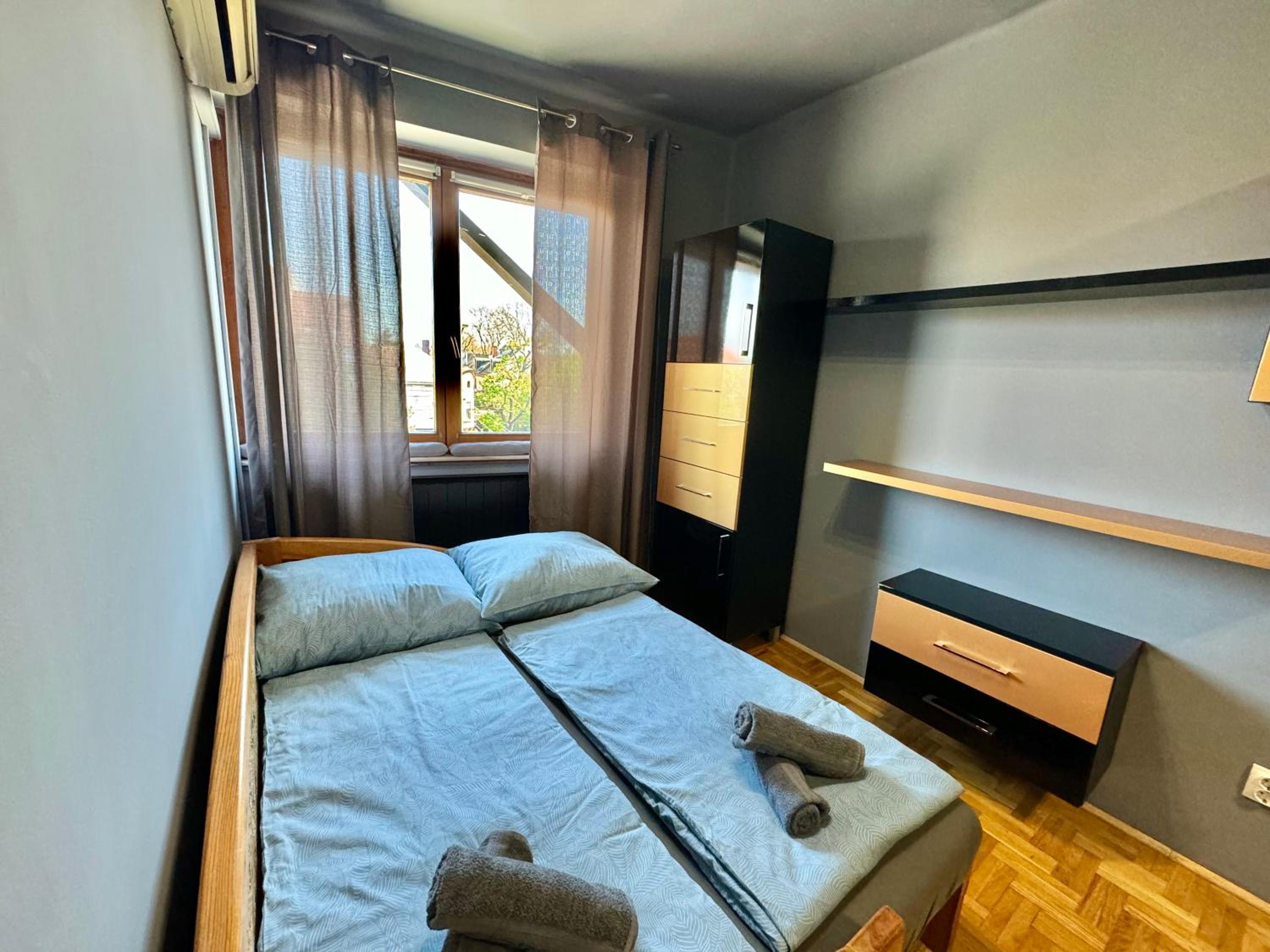 Three-Bedroom Apartment - Photo 10