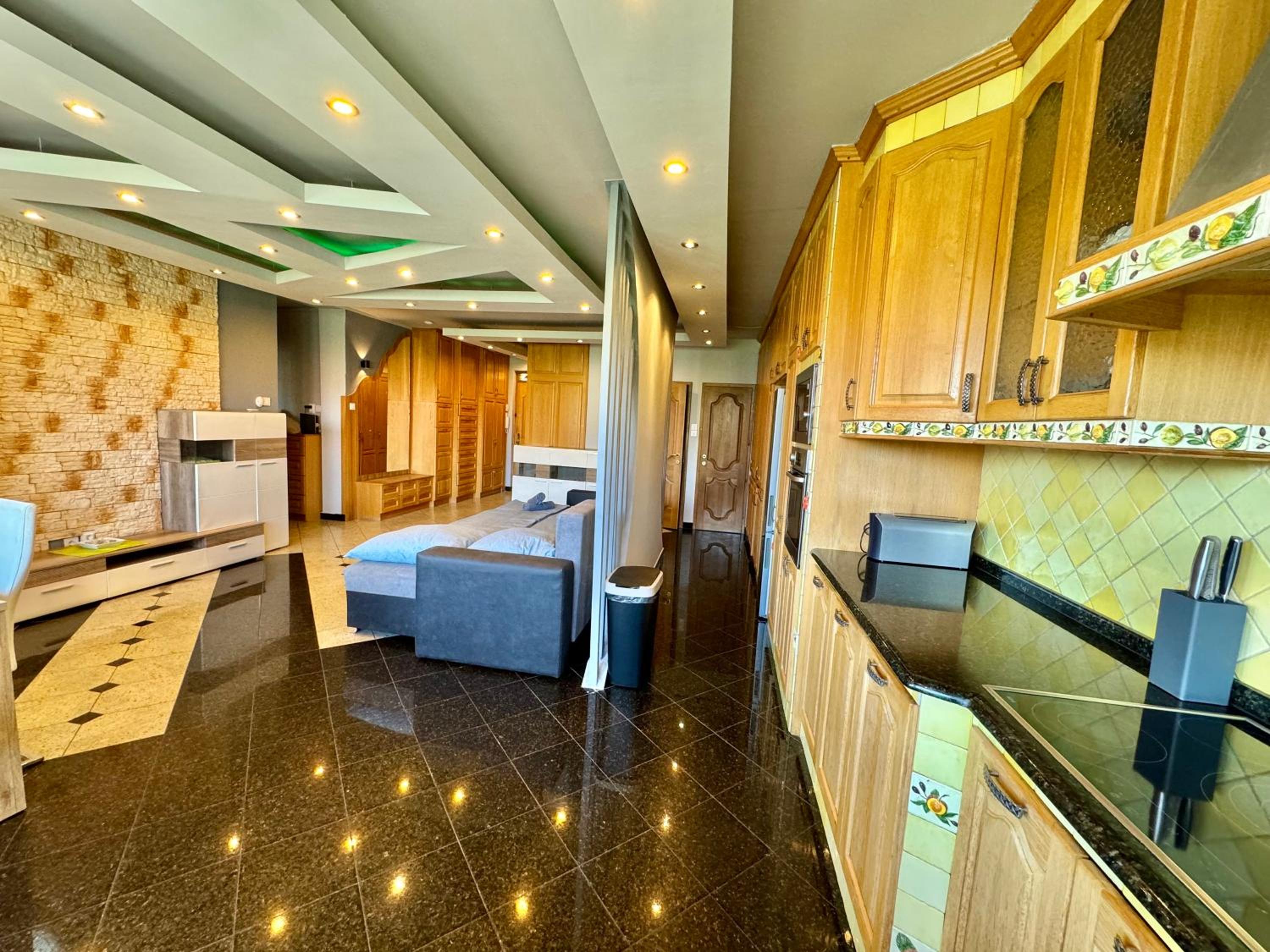 Three-Bedroom Apartment - Photo 17