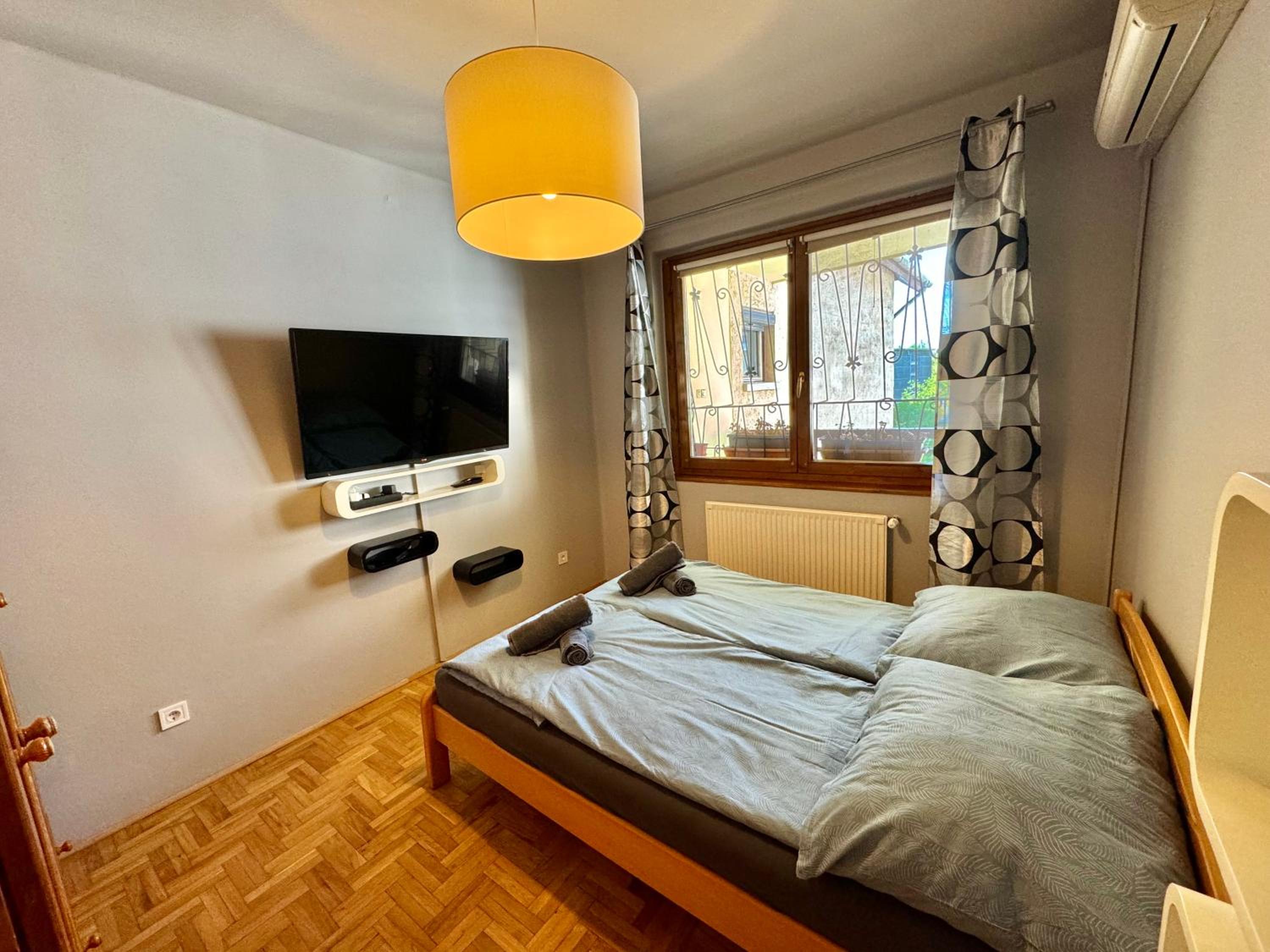 Three-Bedroom Apartment - Photo 18