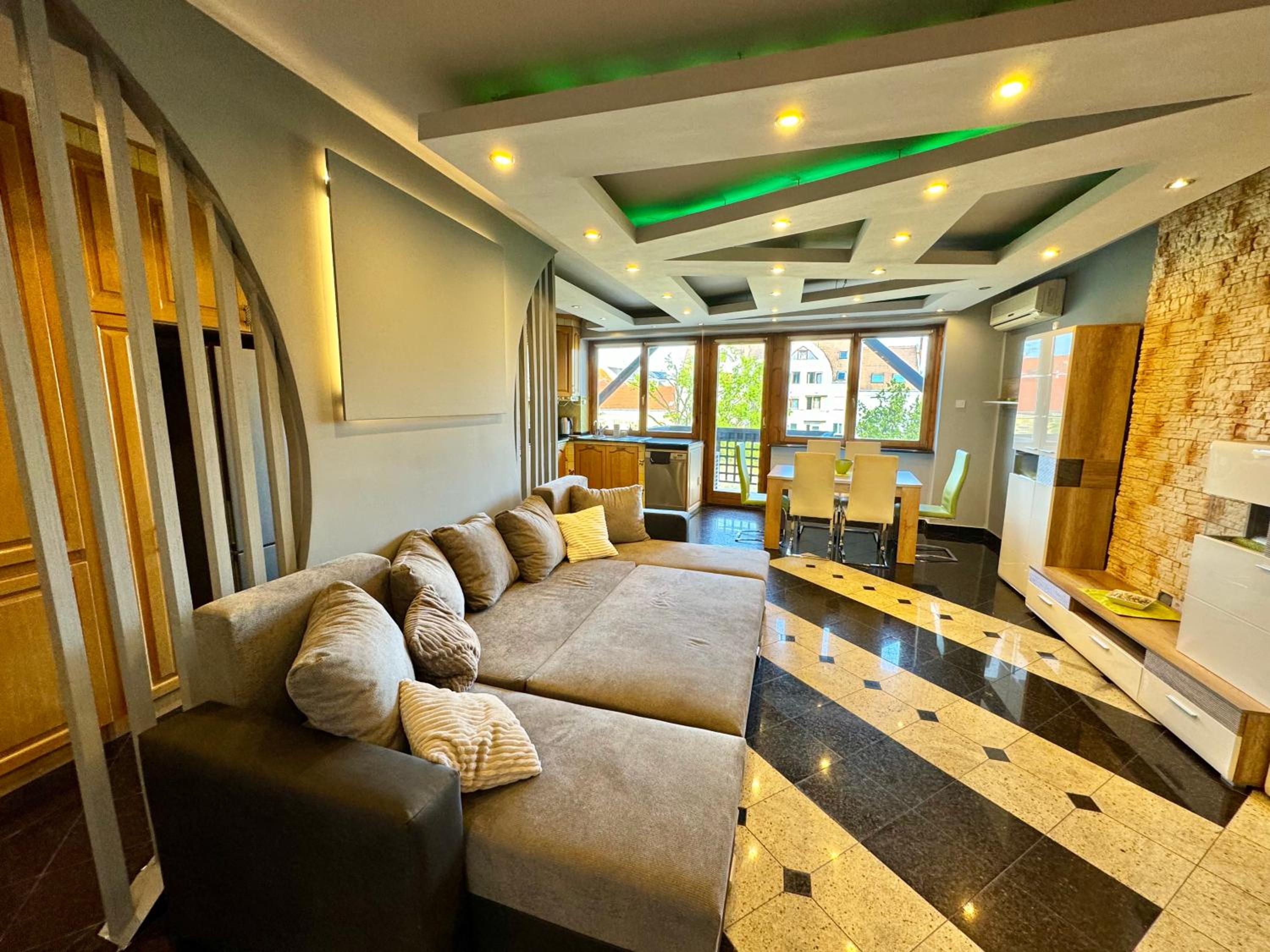Three-Bedroom Apartment - Photo 23