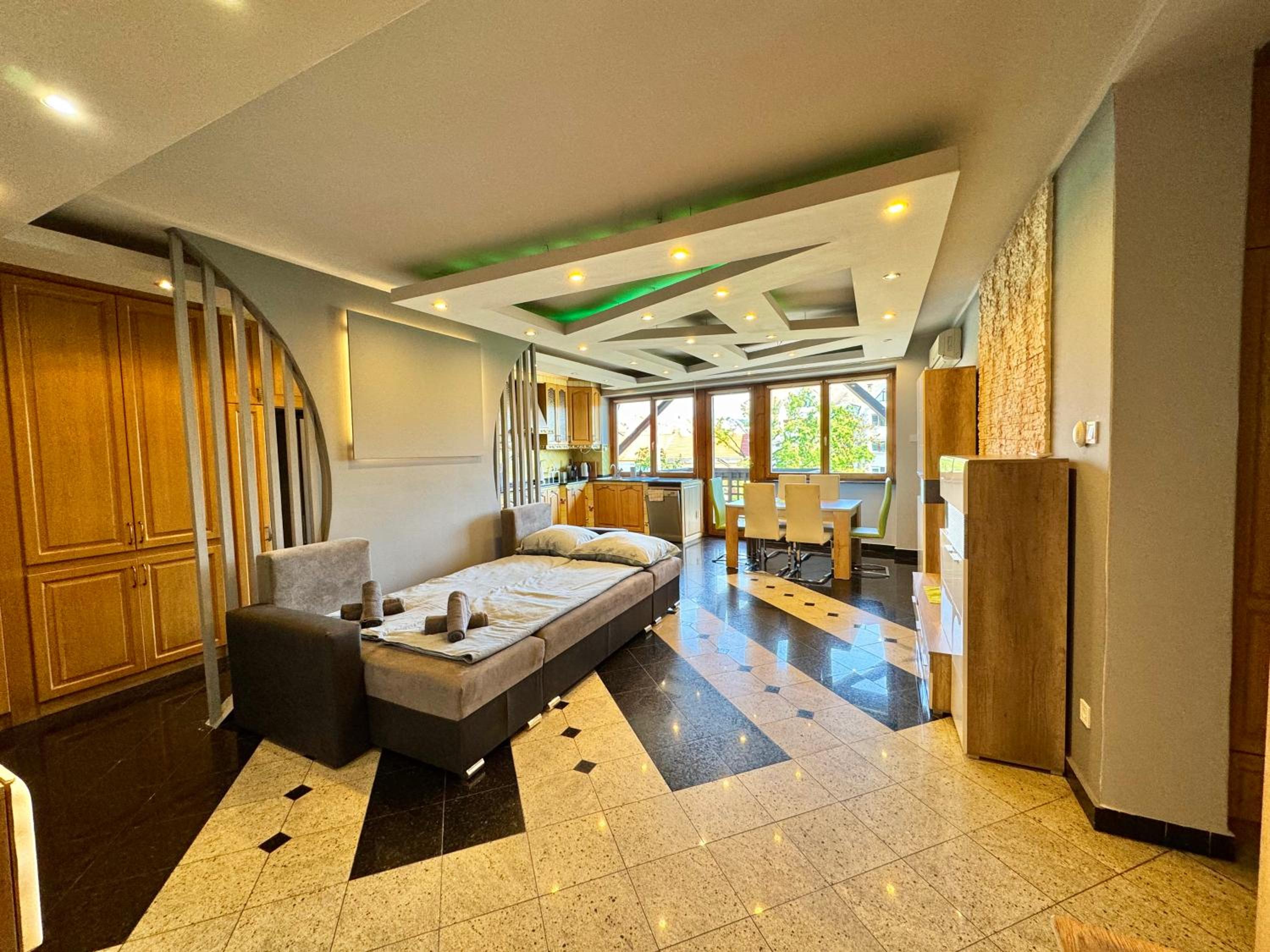 Three-Bedroom Apartment - Photo 28