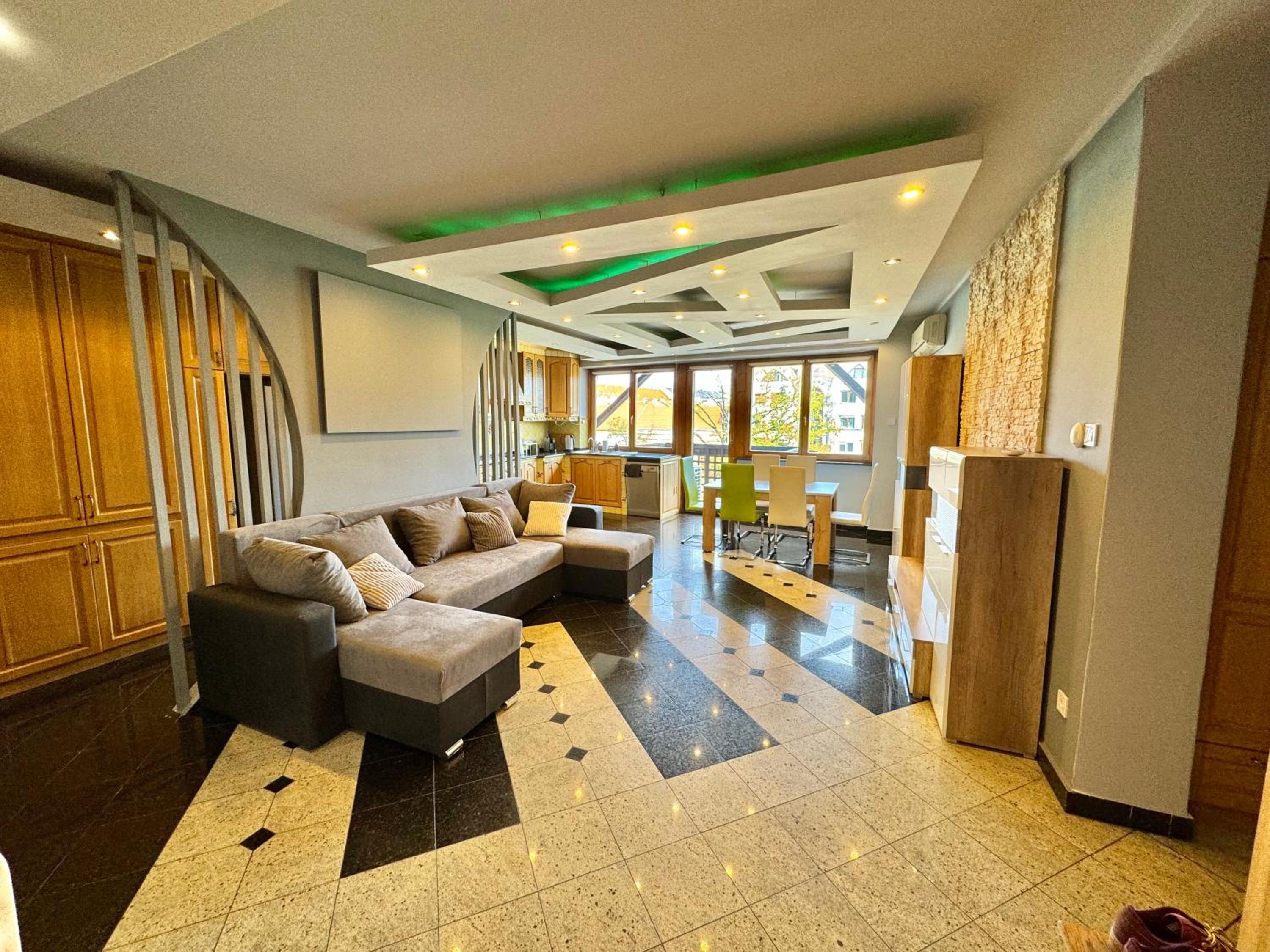 Three-Bedroom Apartment - Photo 1