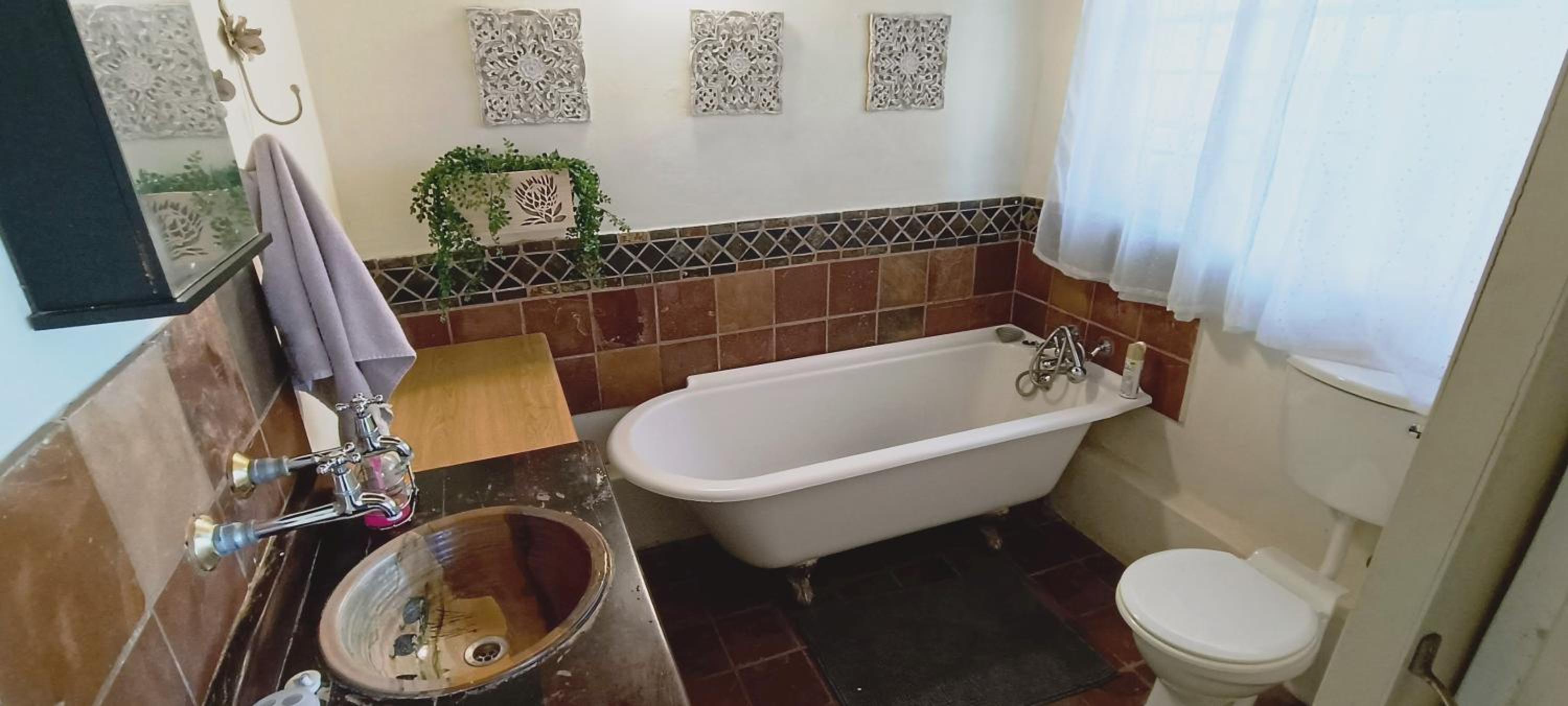 Three-Bedroom House - Photo 18