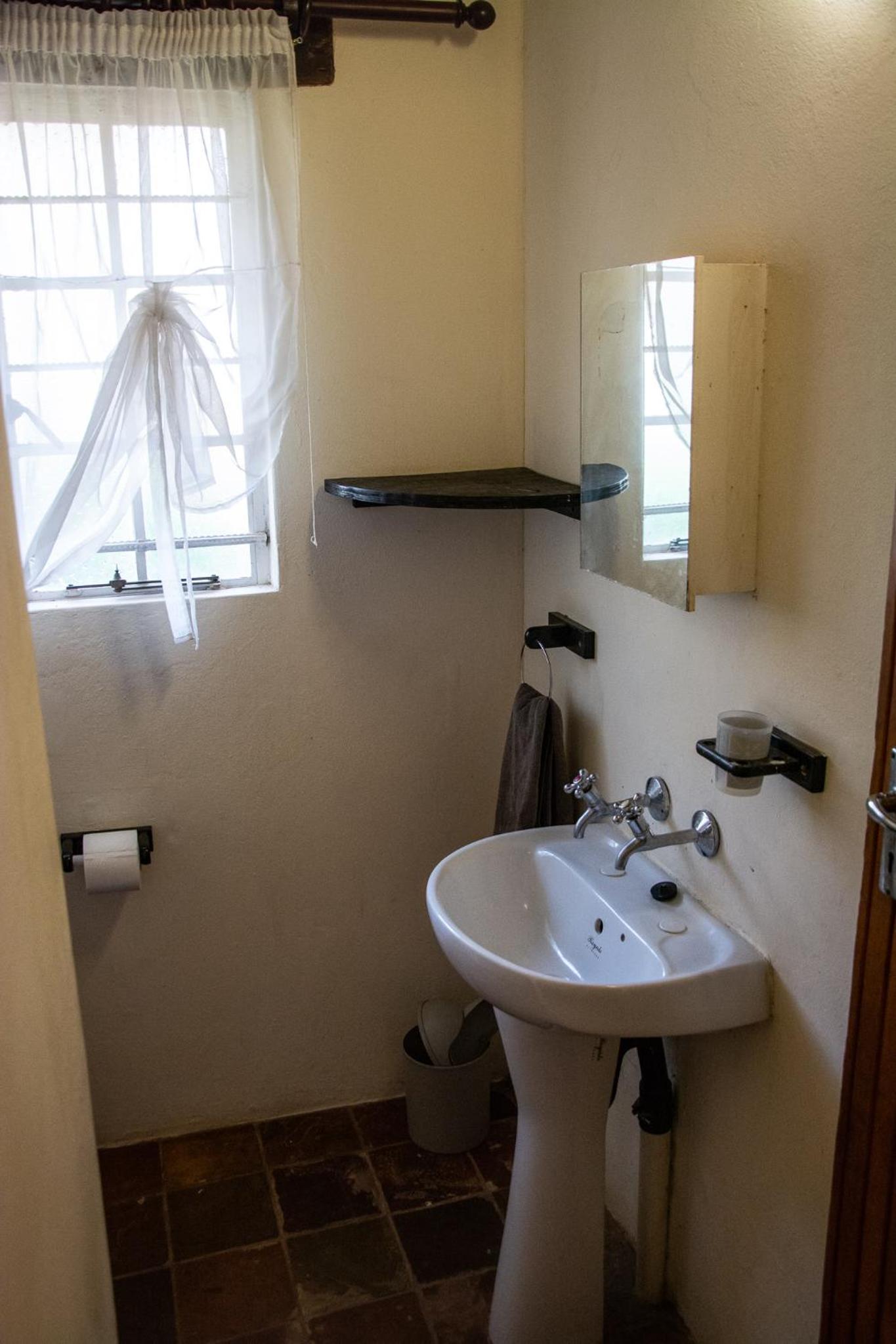 Three-Bedroom House - Photo 17