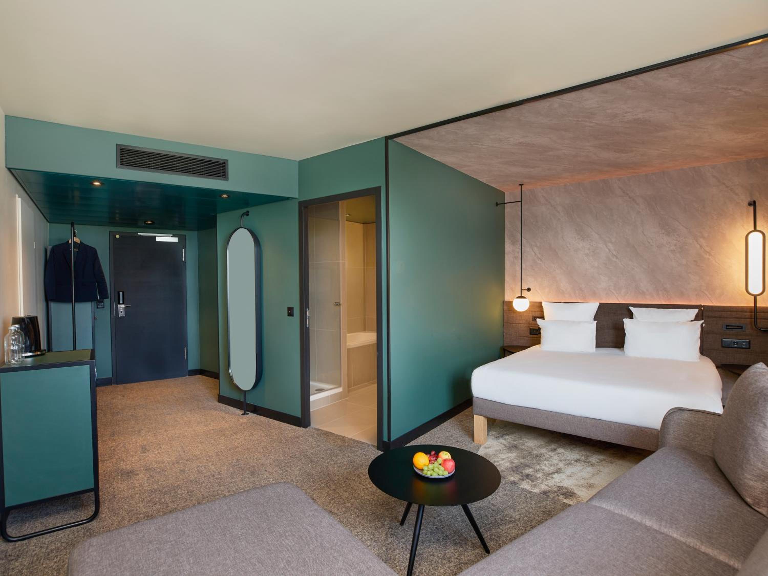 Junior Suite with One Queen Bed and Sofa - Photo 1