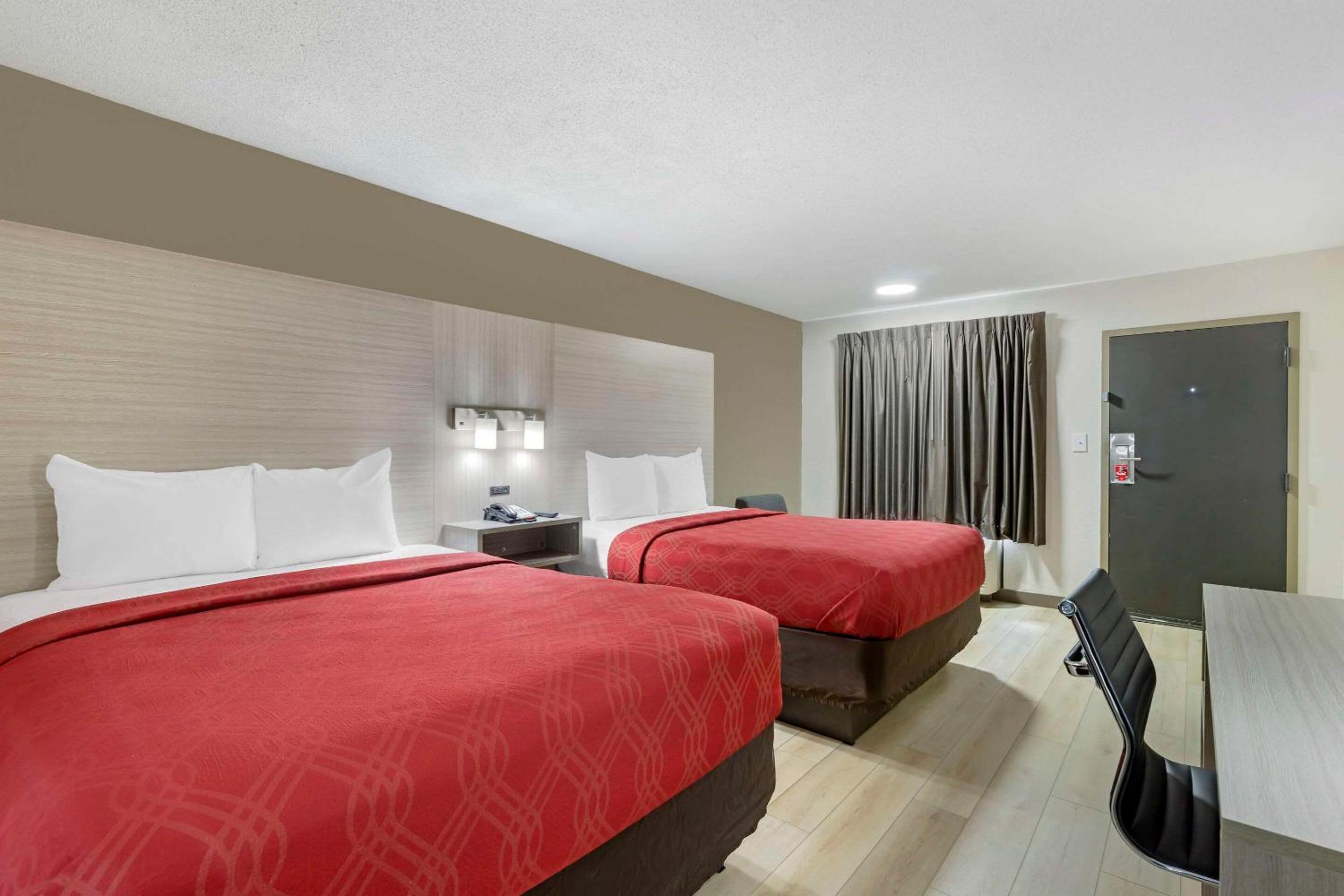 Queen Room with Two Queen Beds - Smoking photo 1