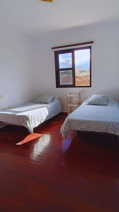Casa de cuatro habitaciones