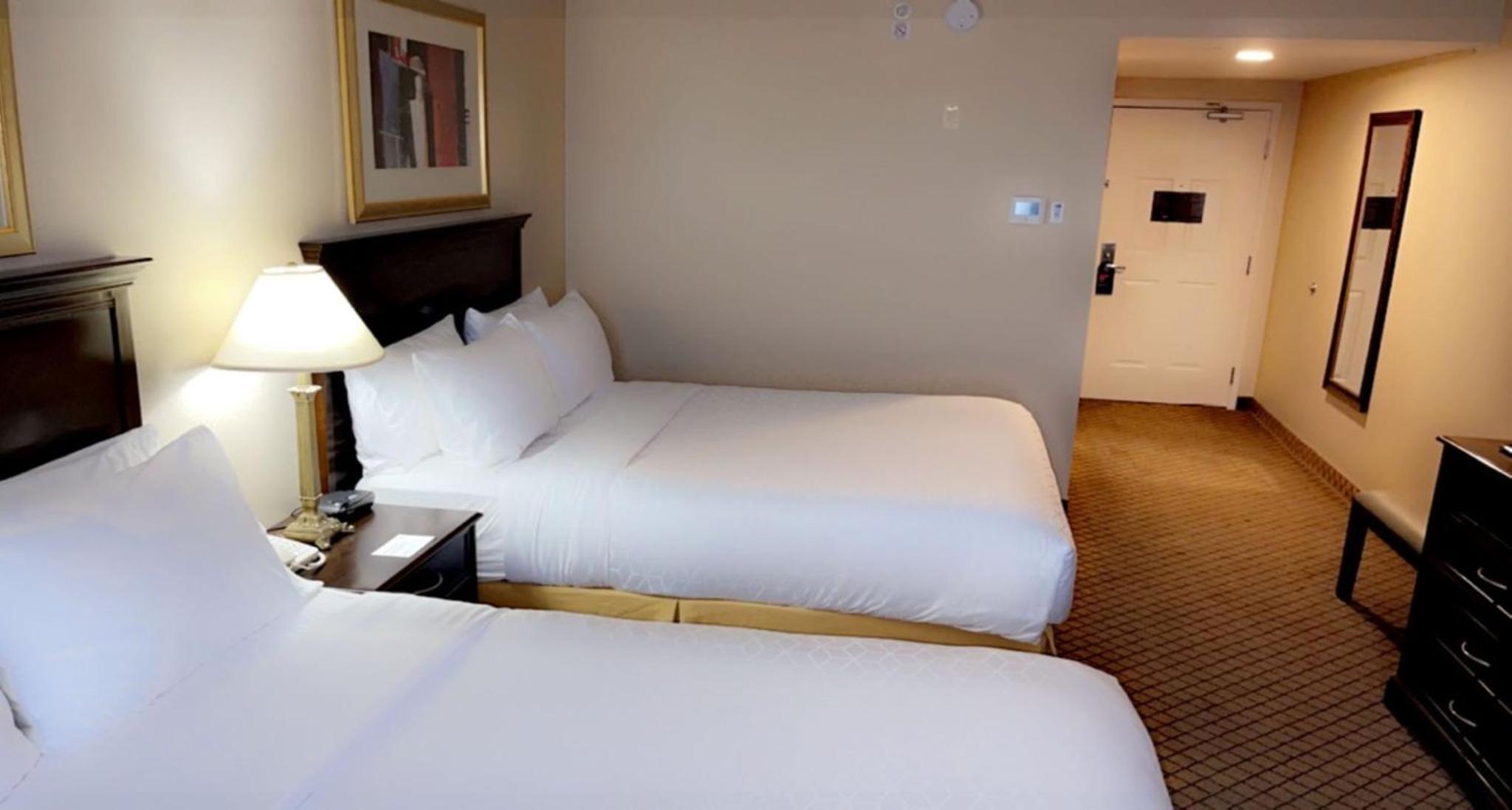 Standard Queen Room with Two Queen Beds and Bath/Shower - Photo 1