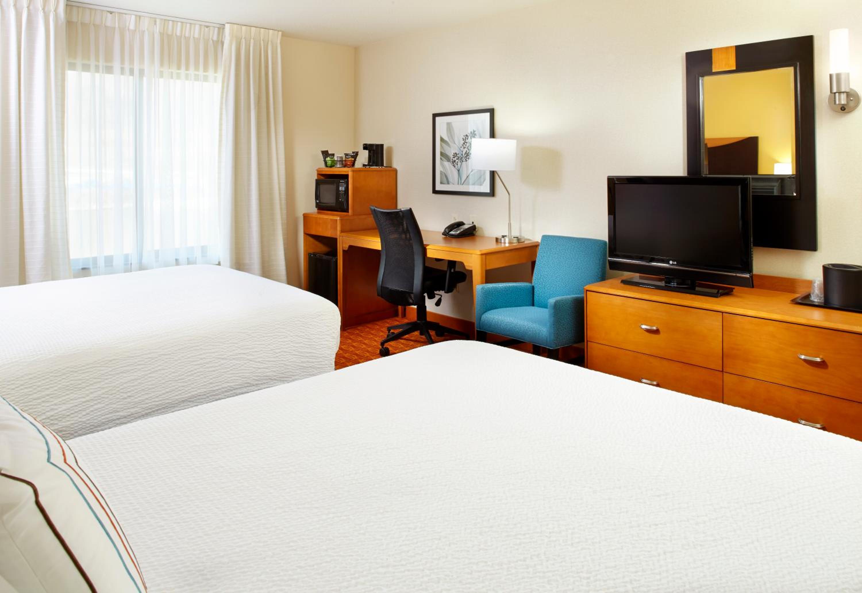 Queen Room with Two Queen Beds - Photo 1