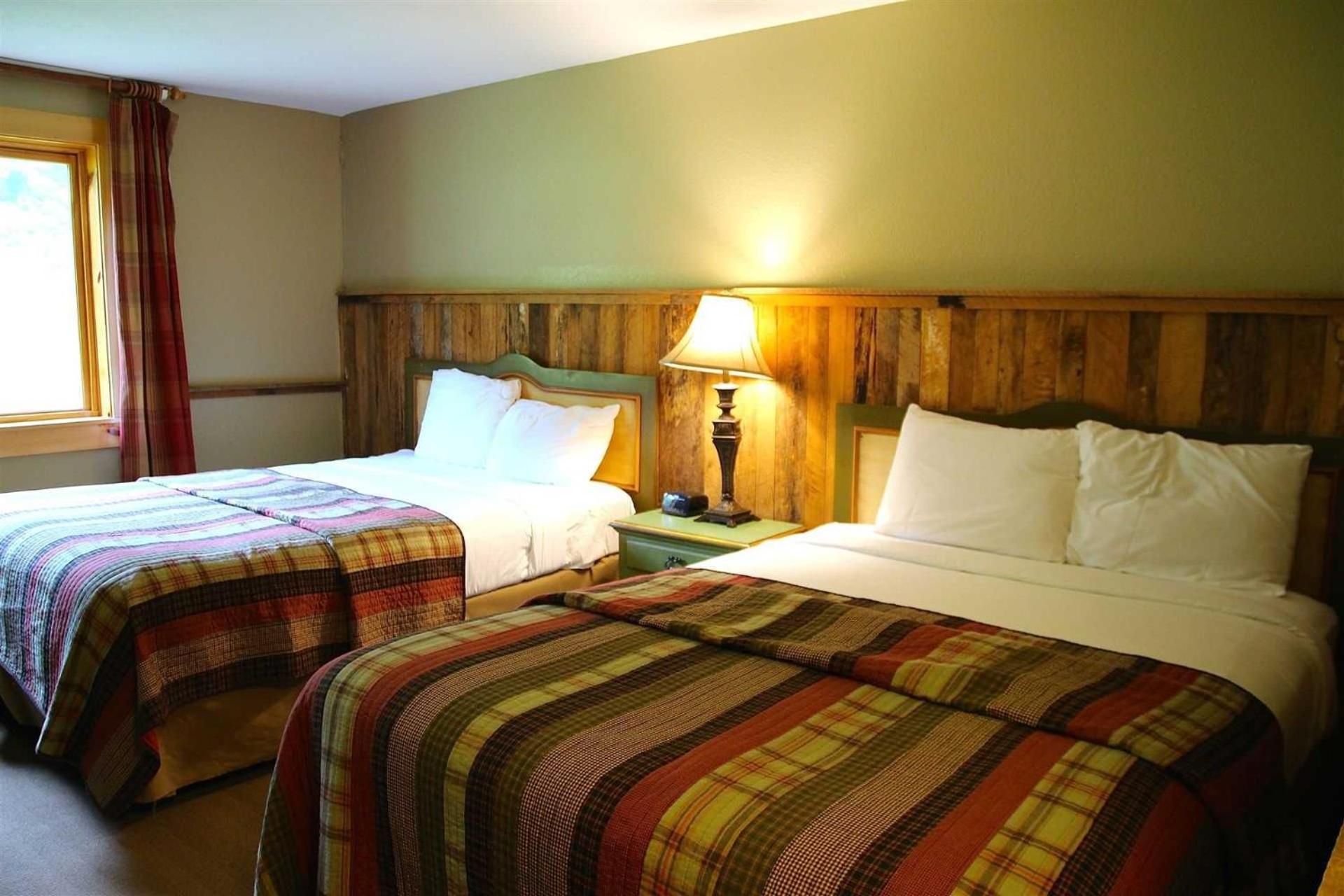 Deluxe Queen Room with Two Queen Beds - Photo 1