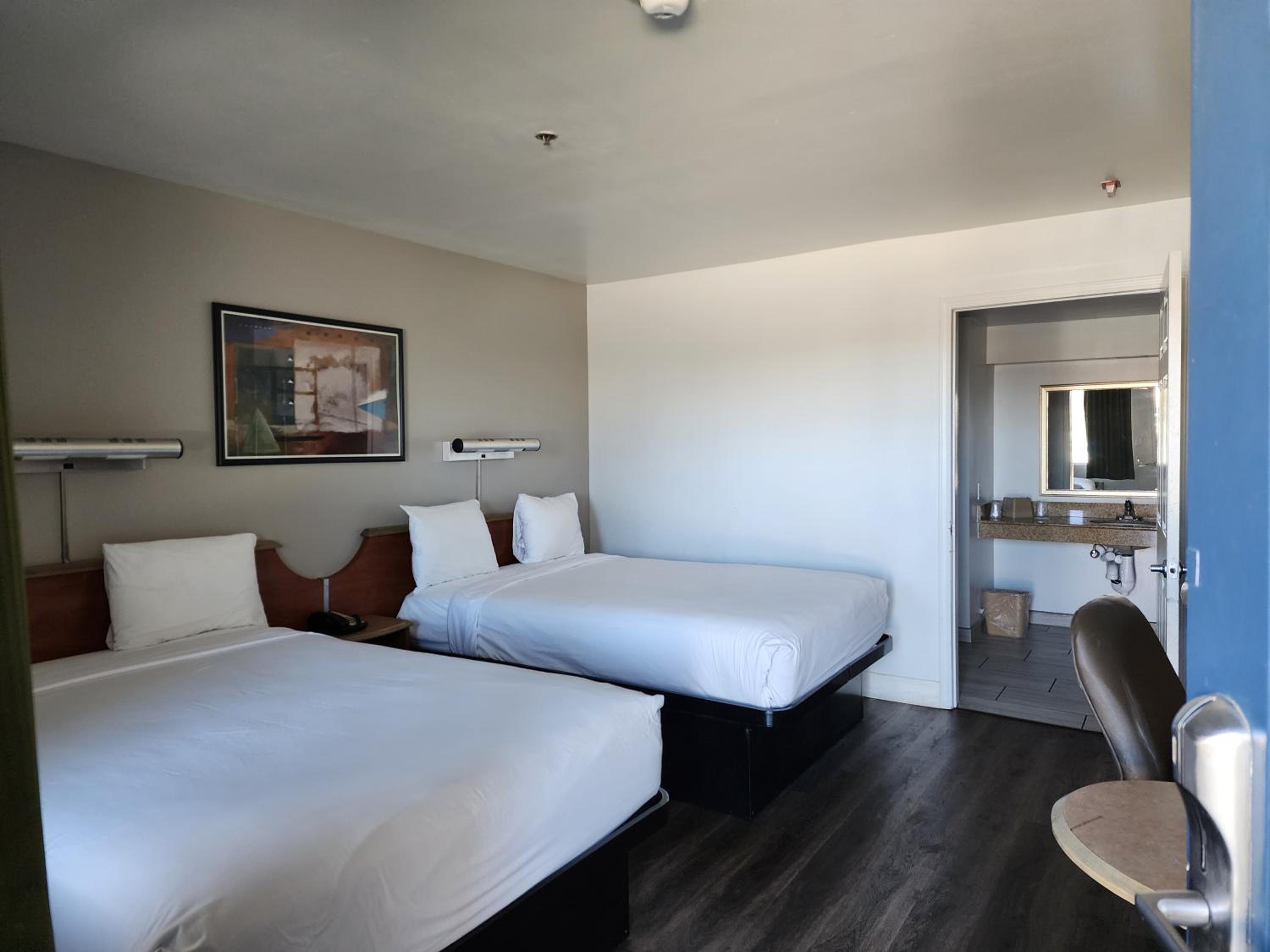 Queen Room with Two Queen Beds - Disability Access - Roll In Shower - Photo 1