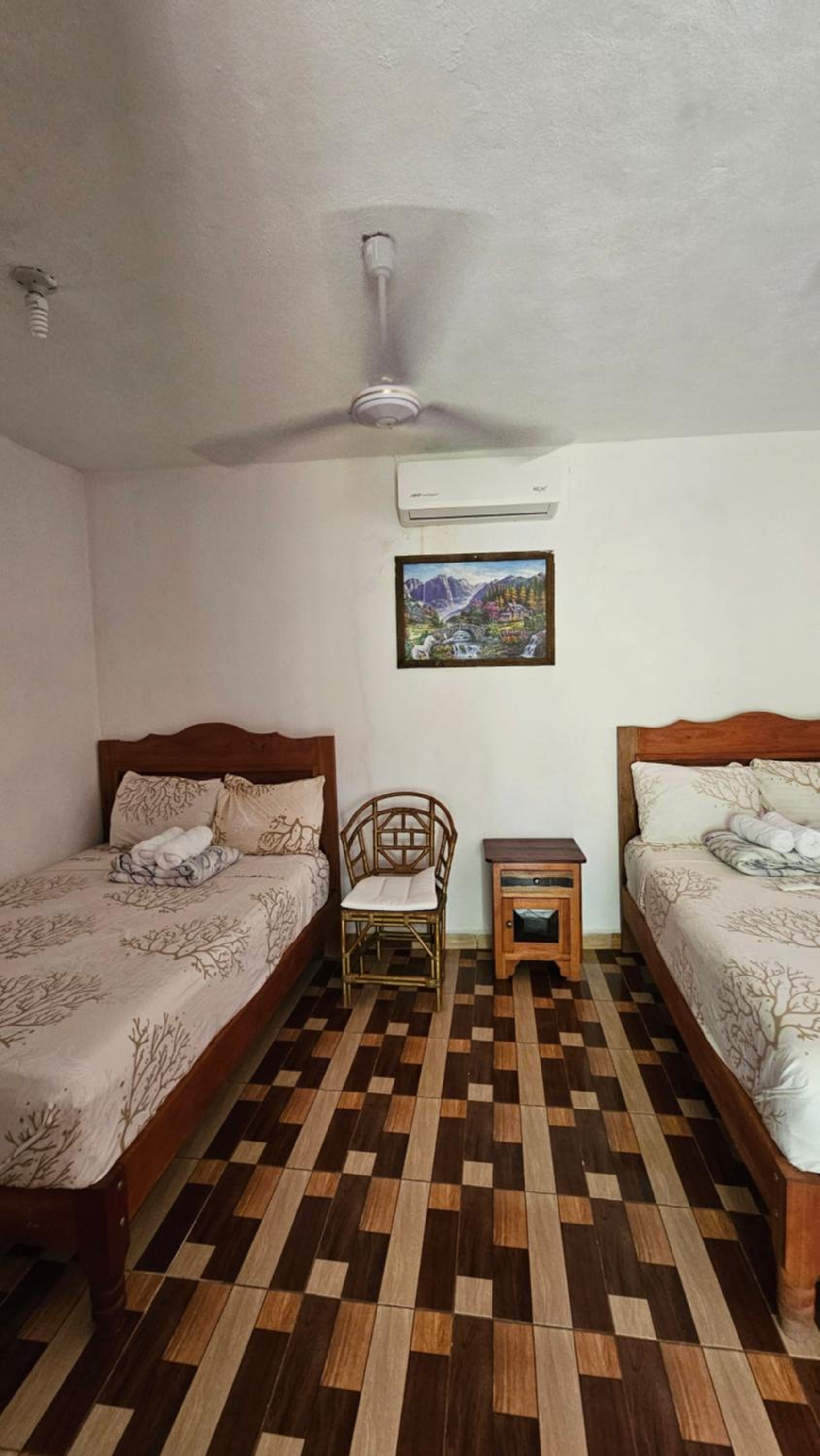 Quadruple Room with Private Bathroom photo 1