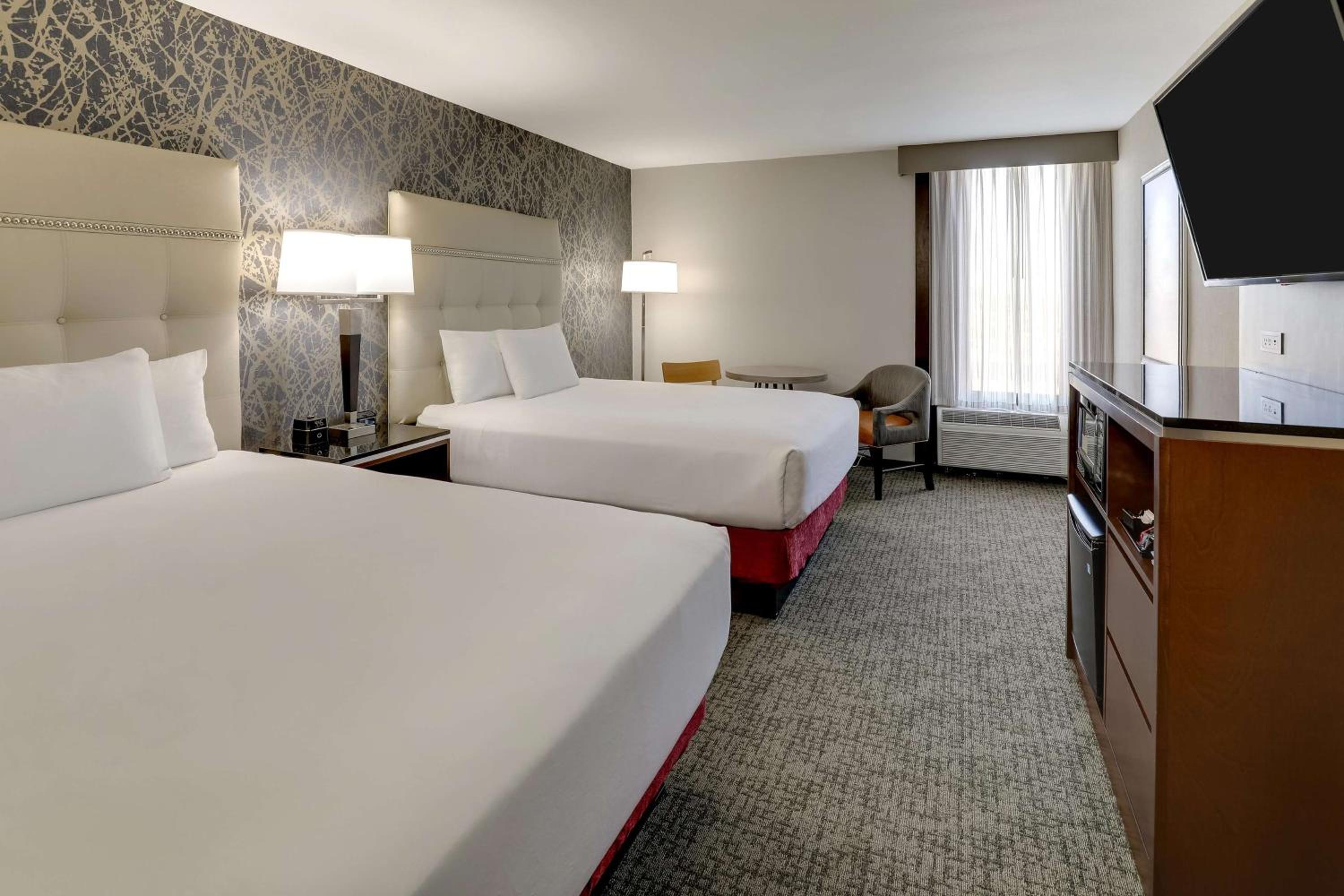 Deluxe Queen Room with Two Queen Beds - Photo 1