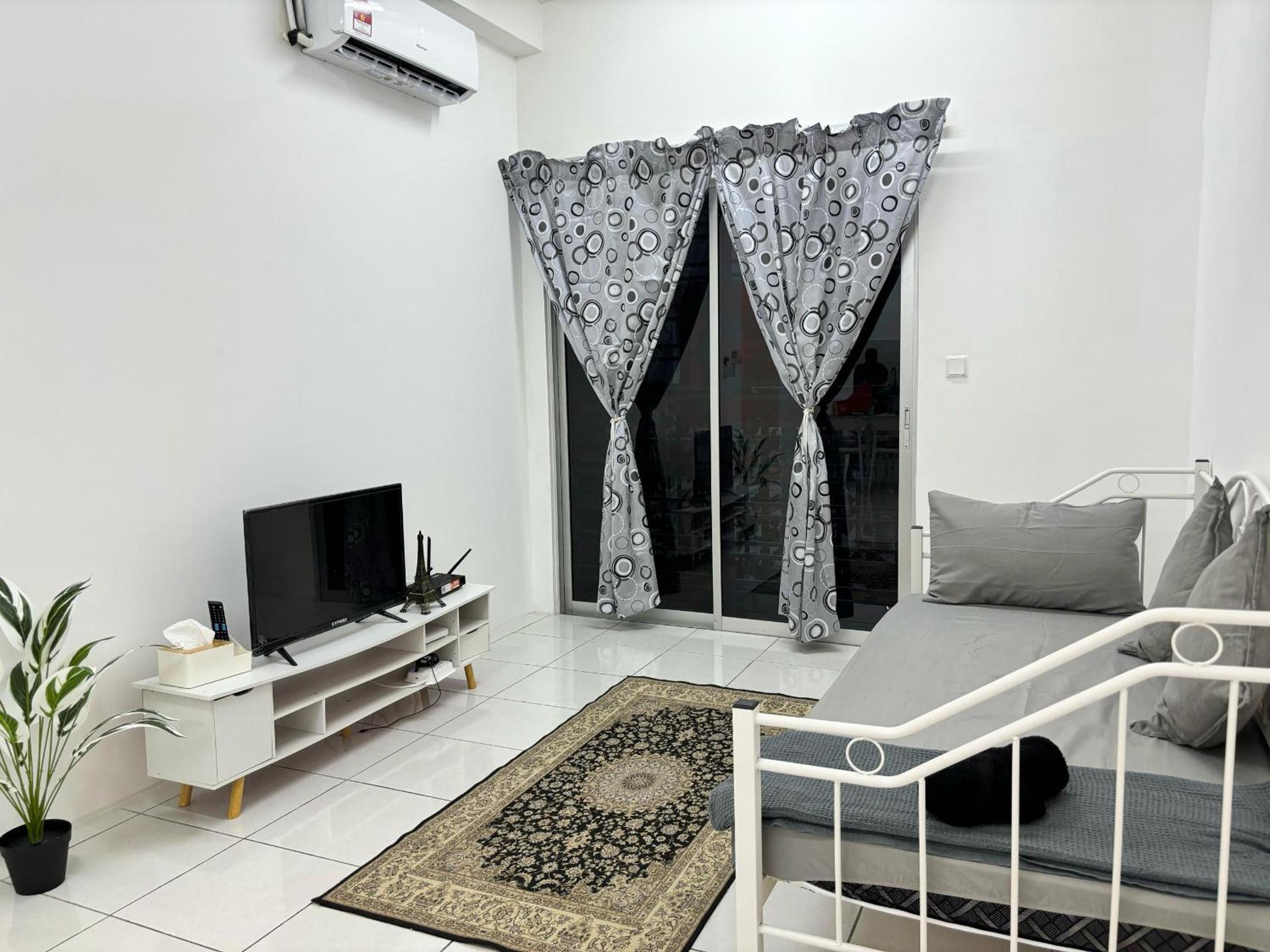 Three-Bedroom Apartment photo 1