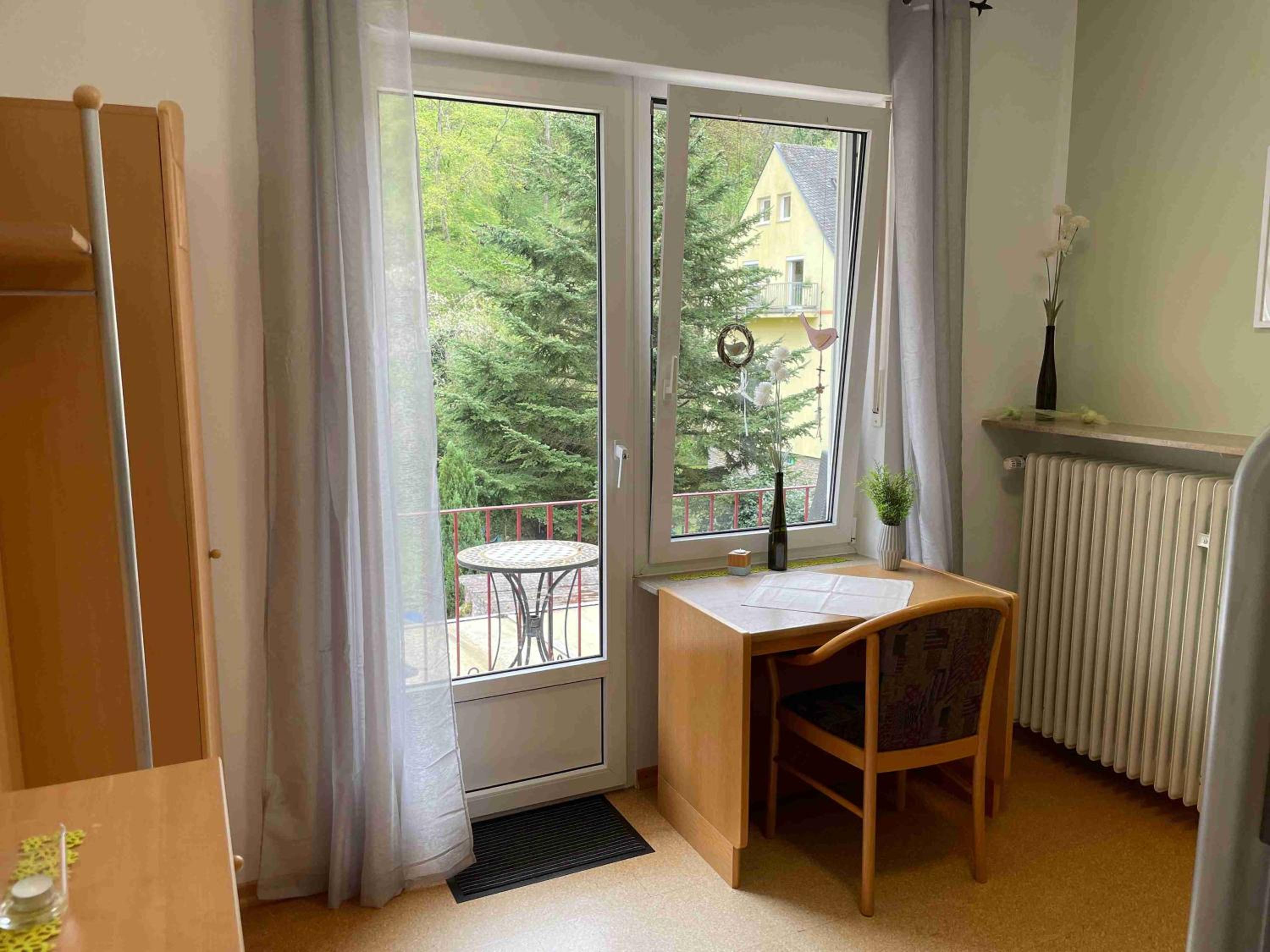 Family Room with Balcony - Photo 3