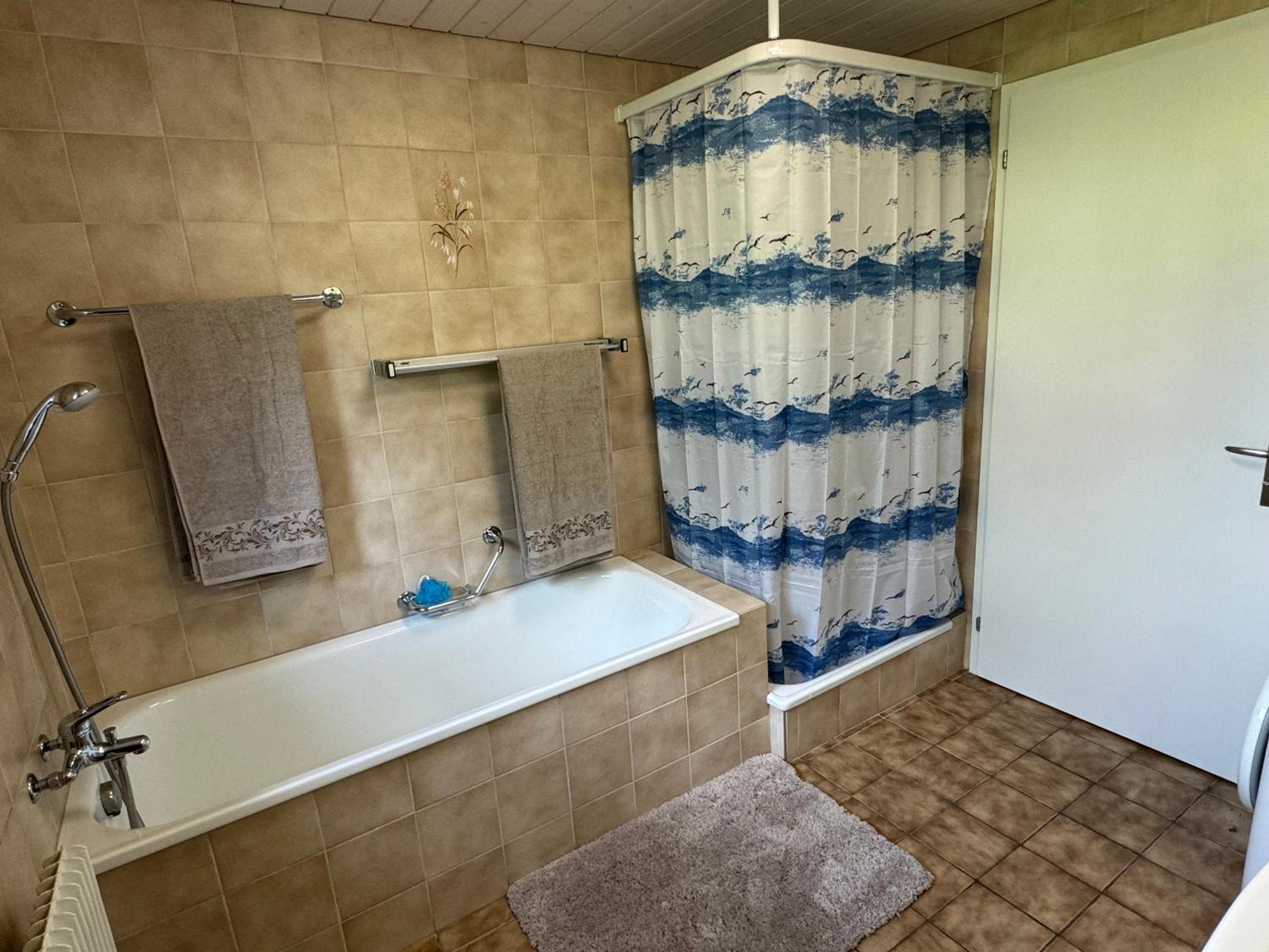 Three-Bedroom Apartment with Balcony photo 2