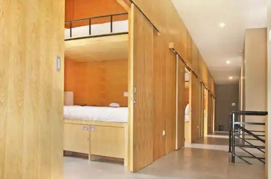 Single Bed In Male Dormitory Room With Shared Bathroom photo 1