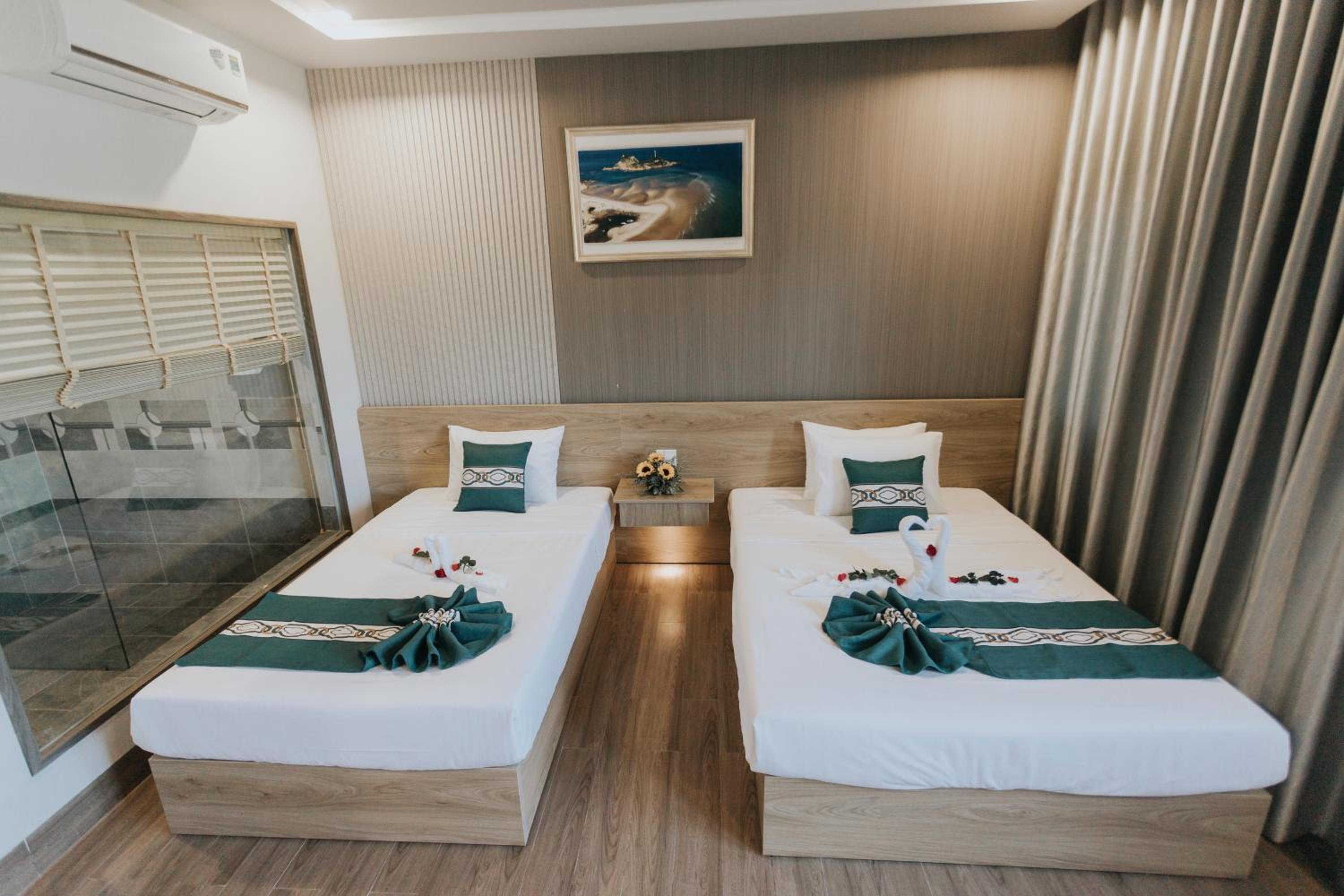 Deluxe Triple Room - Photo 8