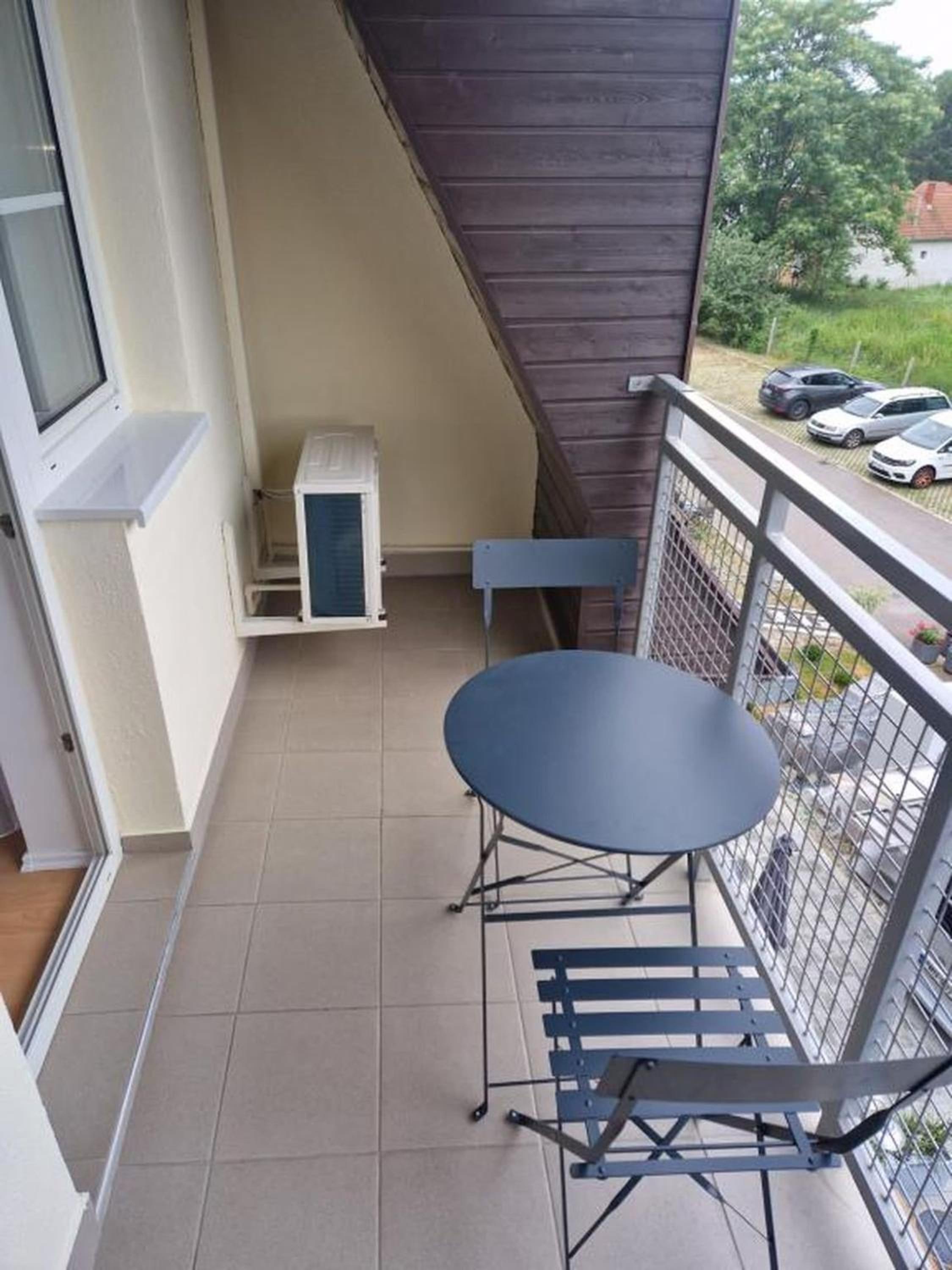 Apartment with Balcony - Photo 17