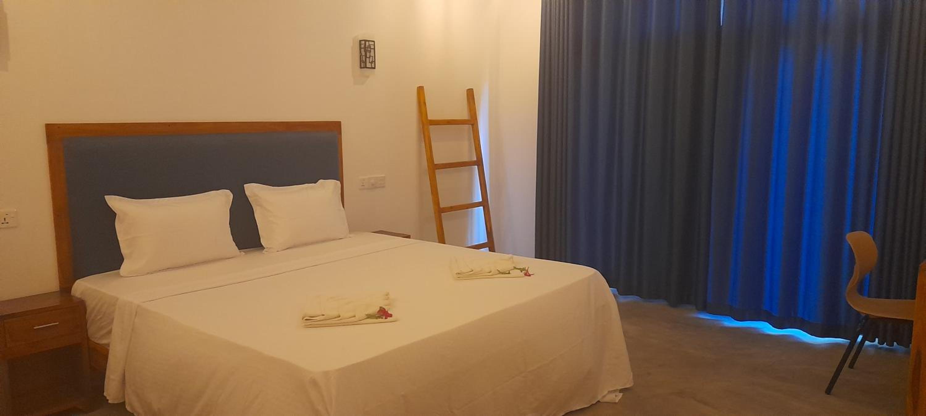 Deluxe Triple Room - Photo 7