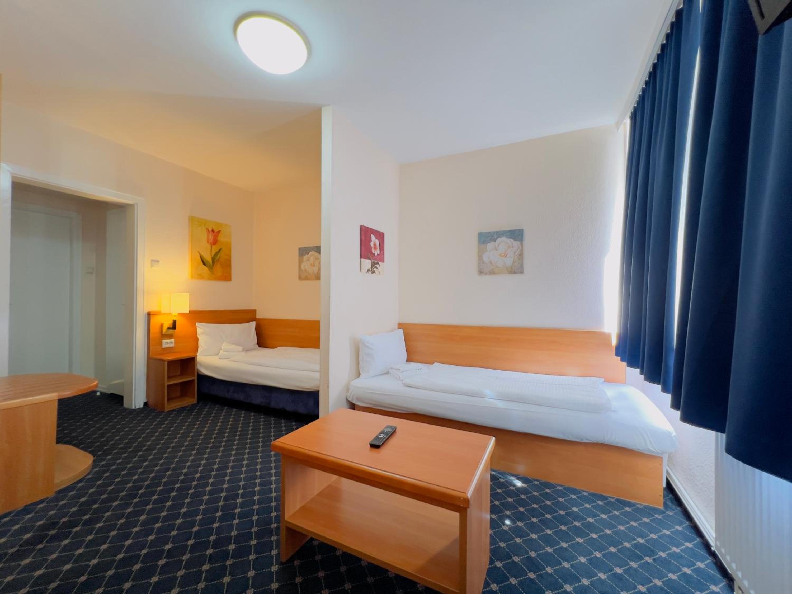 Quadruple Room - Photo 7