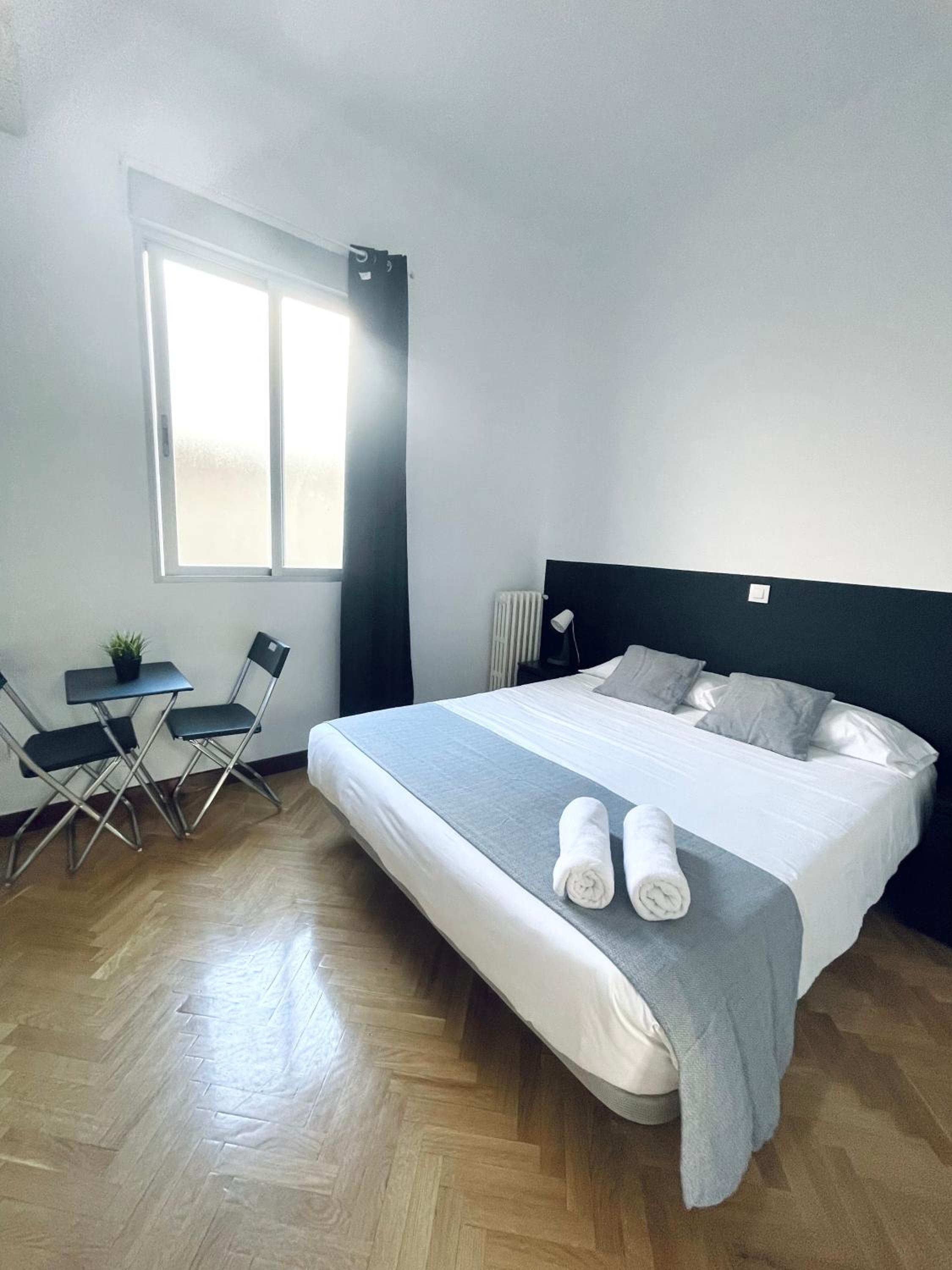 Habitación doble con baño compartido