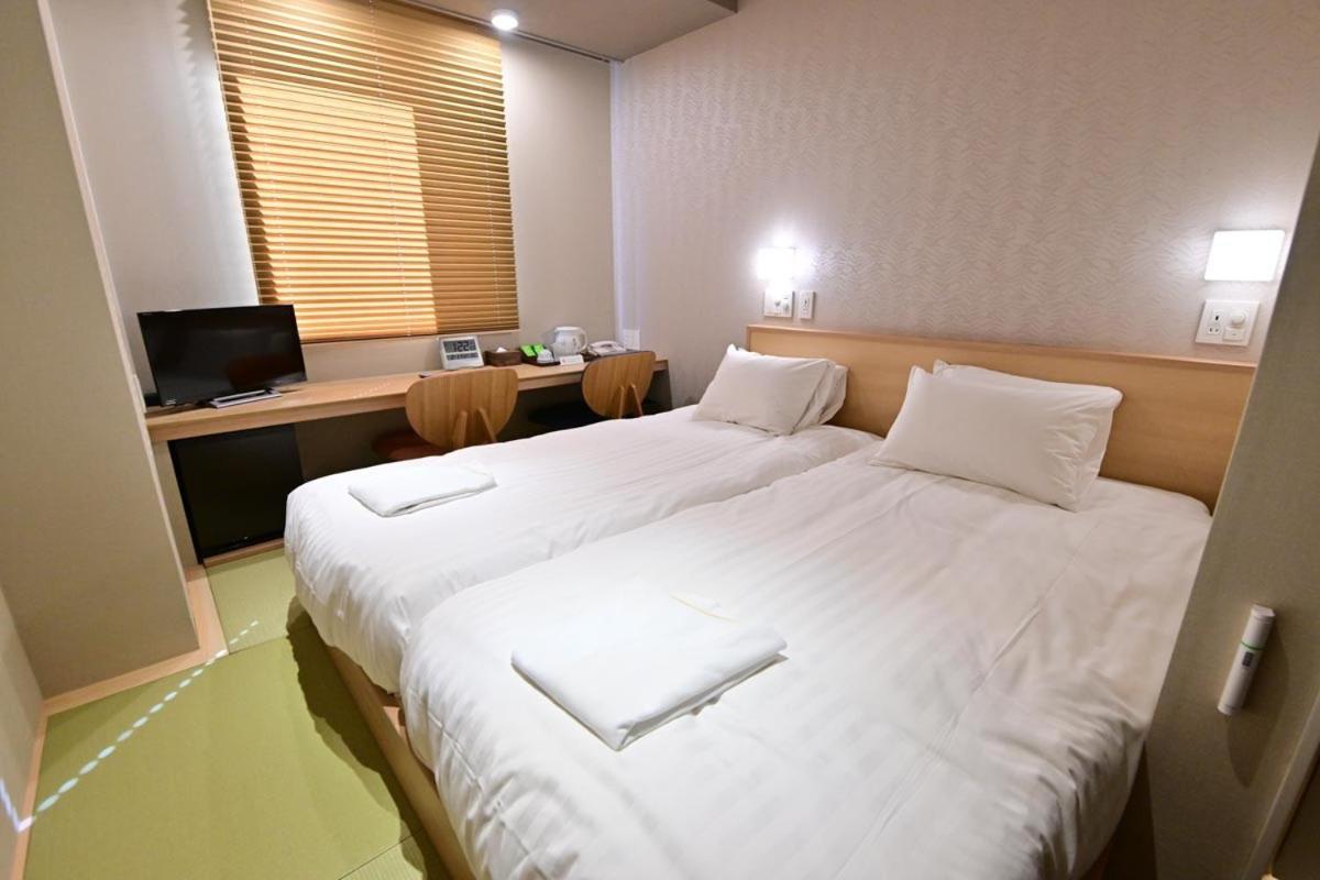 Economy Twin Room - Photo 1