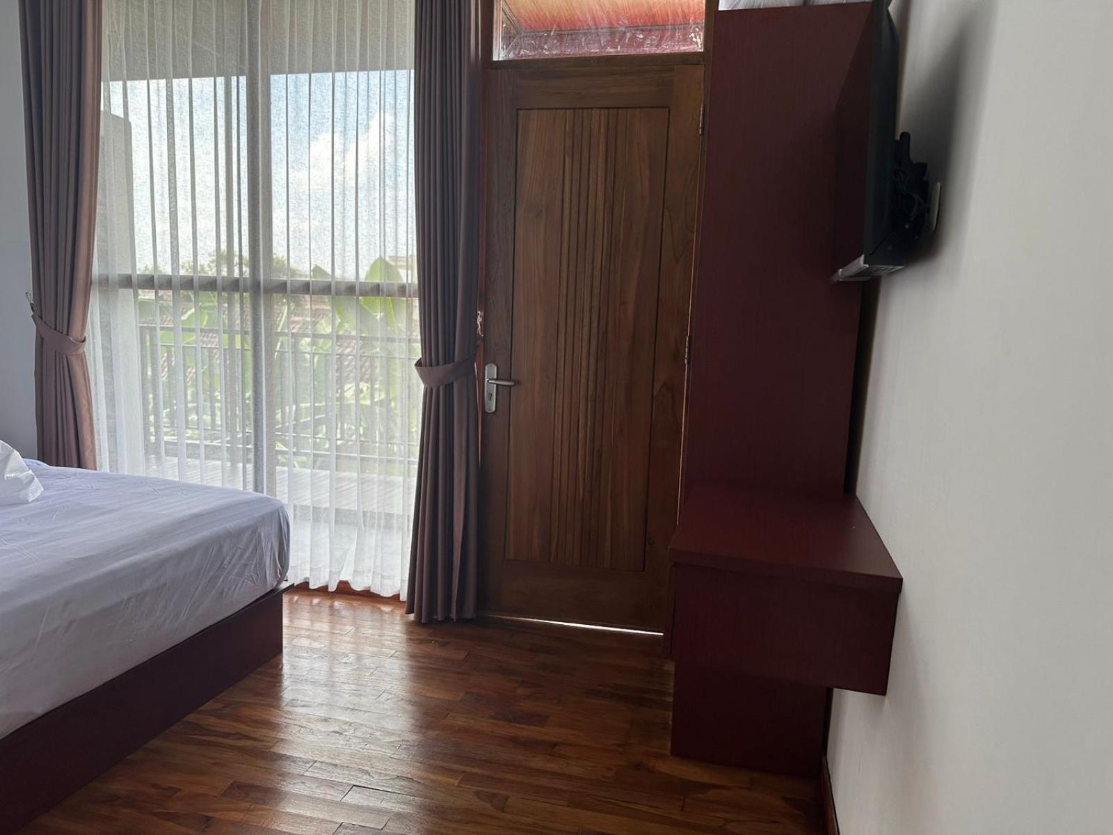 Deluxe Room - Photo 3
