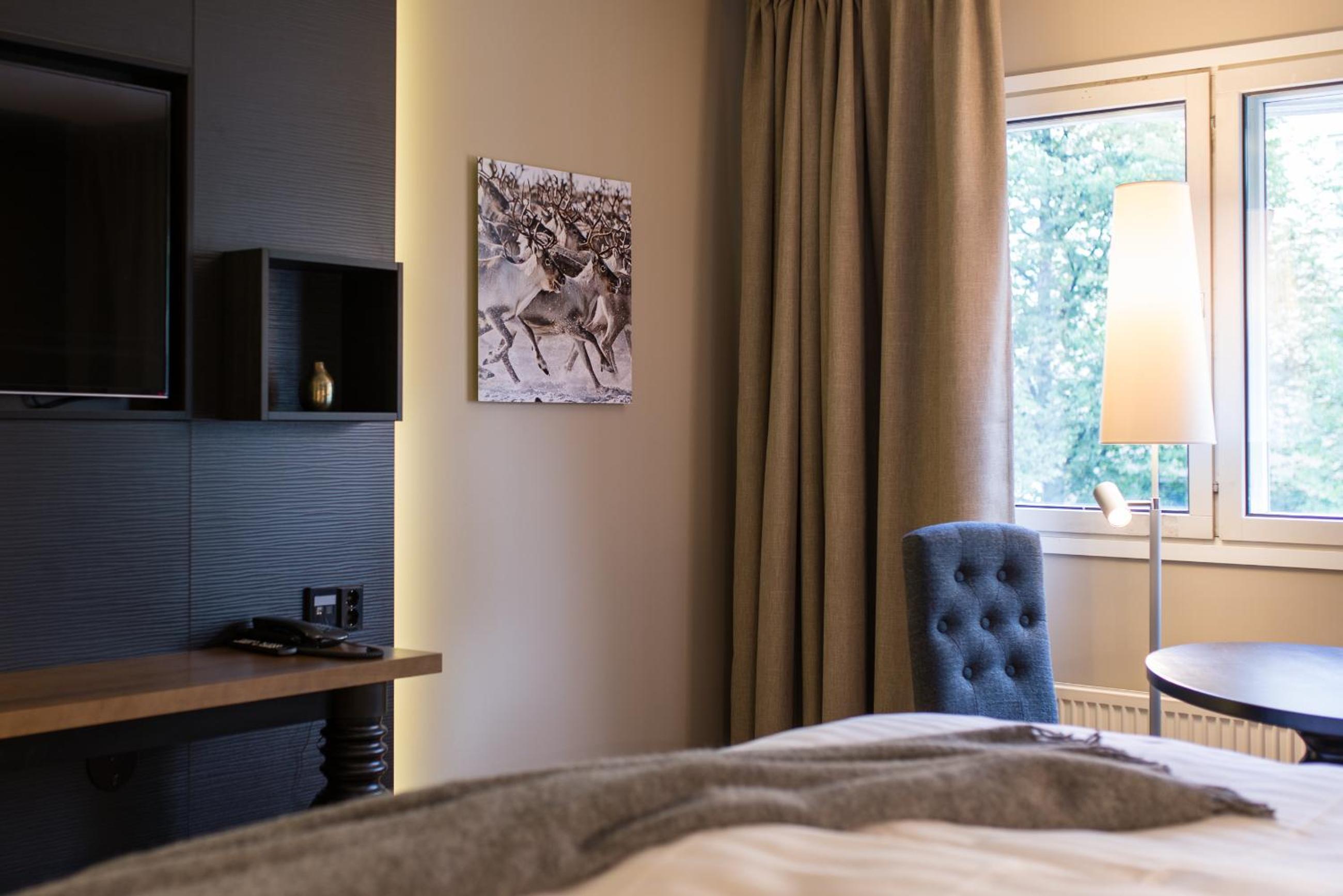 Northern Deluxe King Room - Photo 7