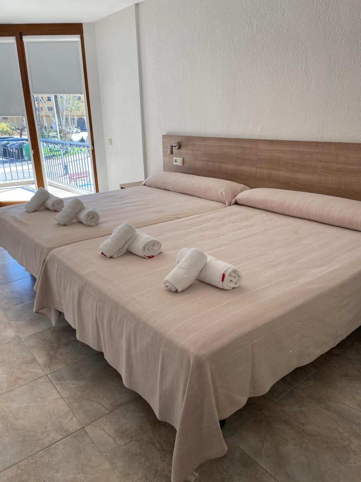 Quadruple Room (2 Adults + 2 Children) - Photo 1