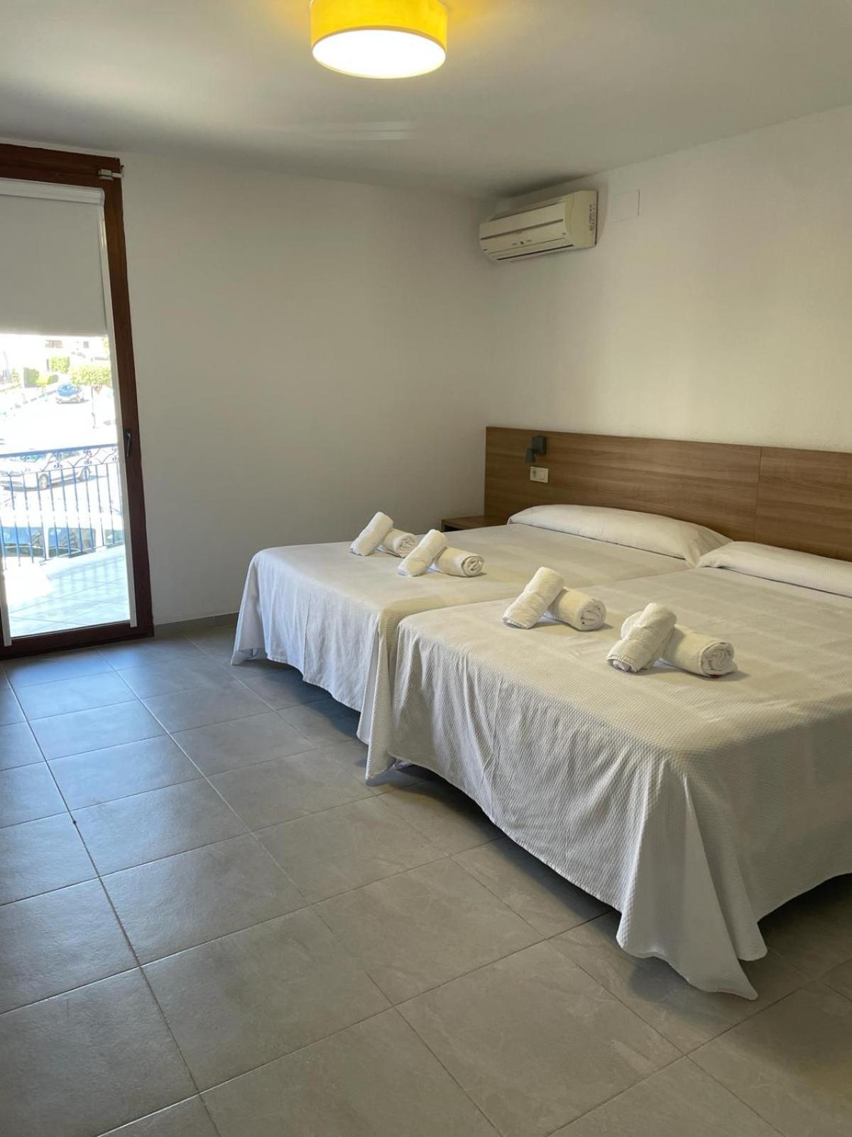 Superior Queen Room with Two Queen Beds - Photo 1