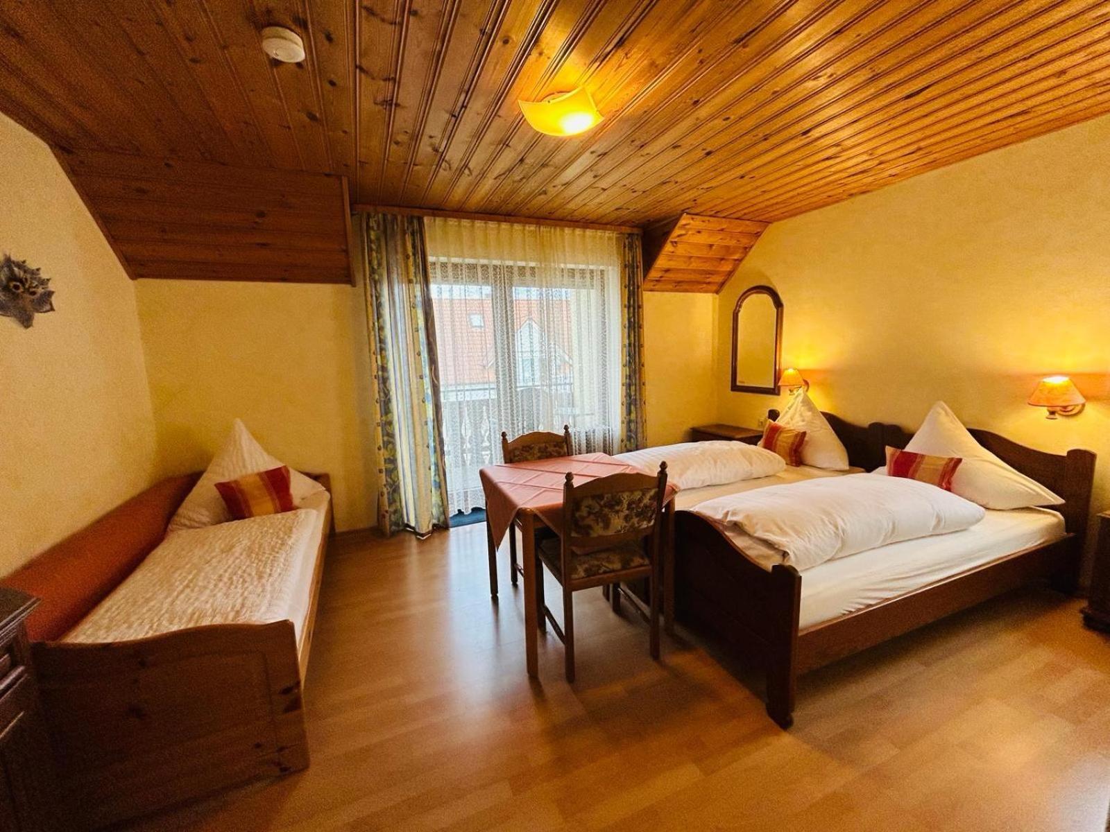 Triple Room with partial lake view and balcony
