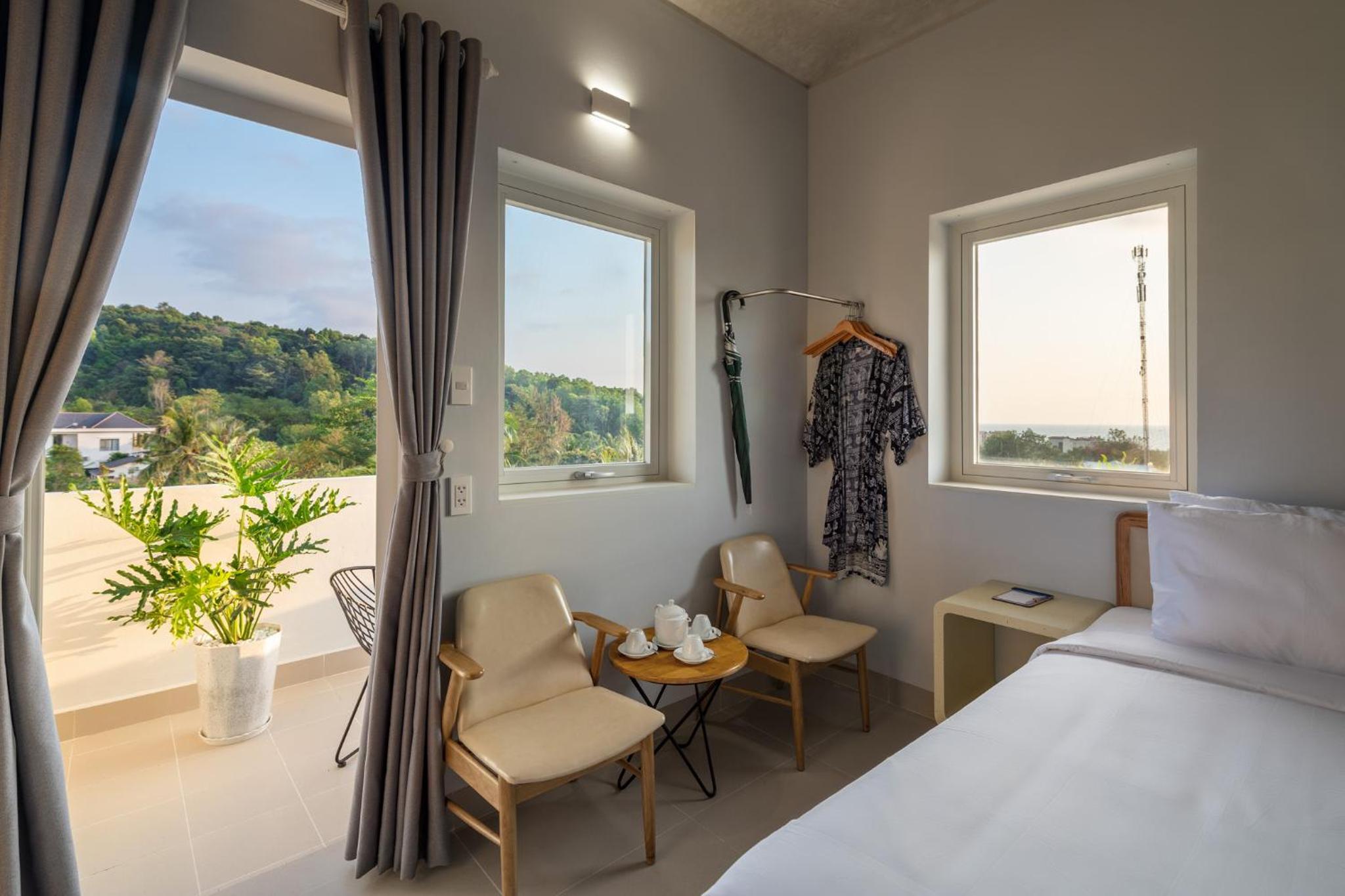 Deluxe Triple Room With Balcony - Photo 1