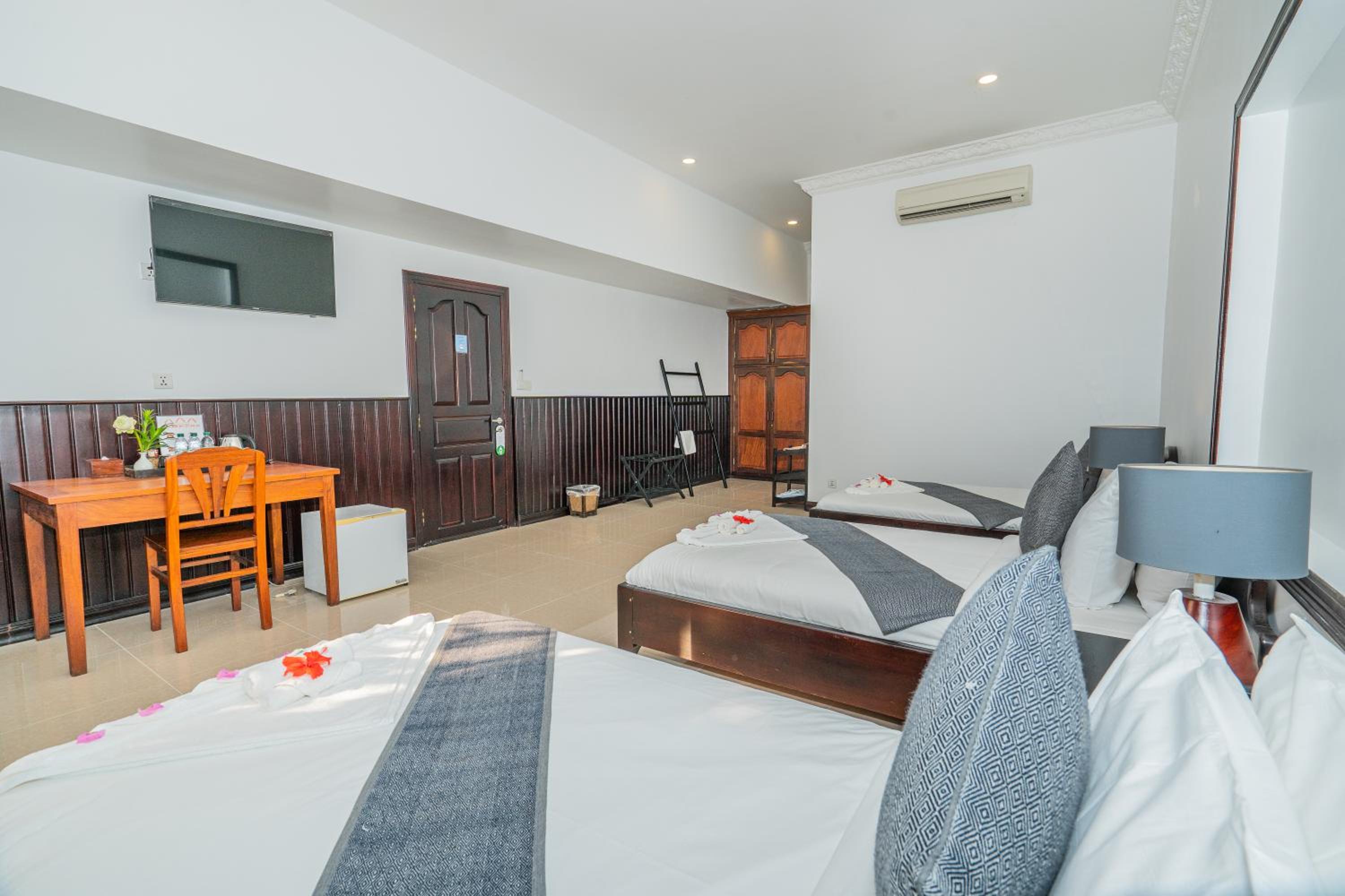 Deluxe Triple Room - Photo 6