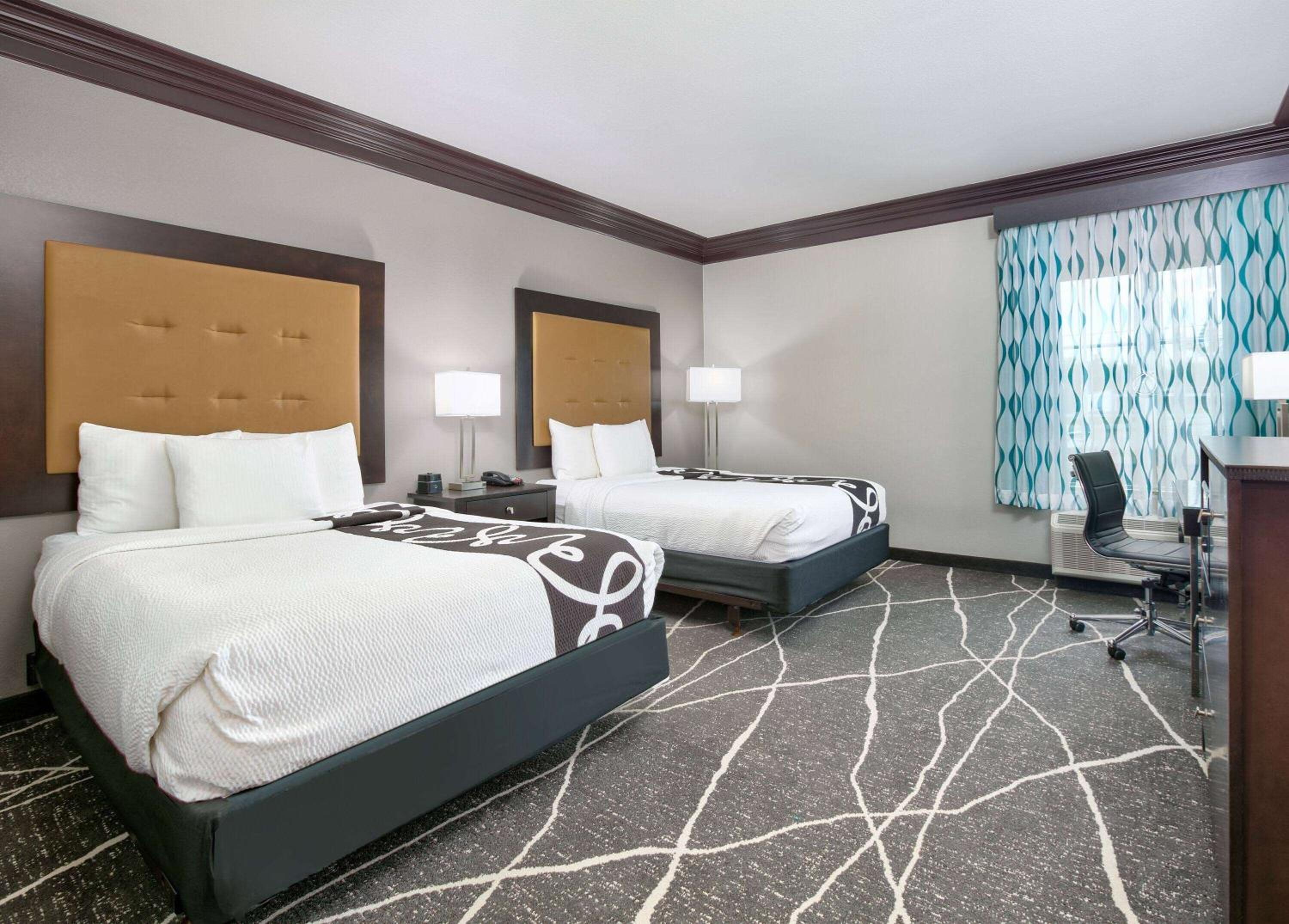 Deluxe Queen Room with Two Queen Beds - Photo 1