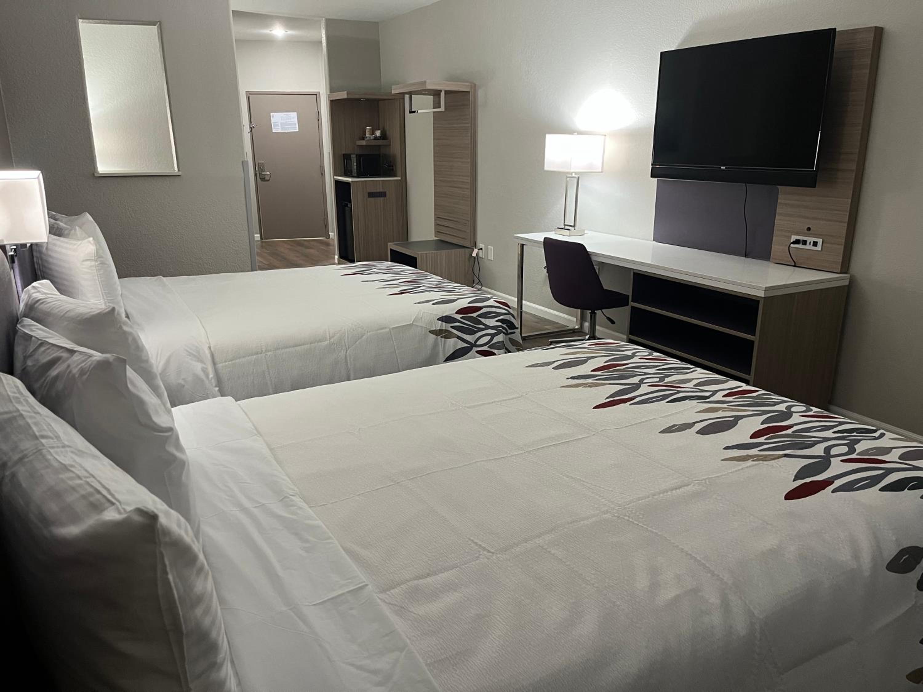 Deluxe Room with Two Queen Beds Disability Access Roll-In Shower Smoke Free
