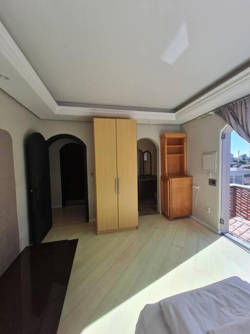 Three-Bedroom Apartment photo 1