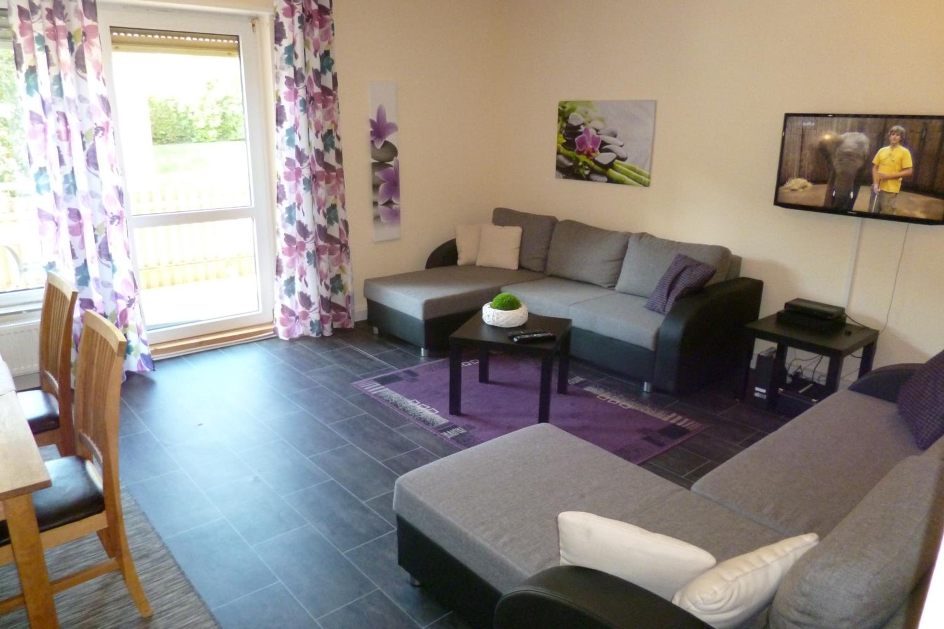 Two-Bedroom Apartment - left photo 1