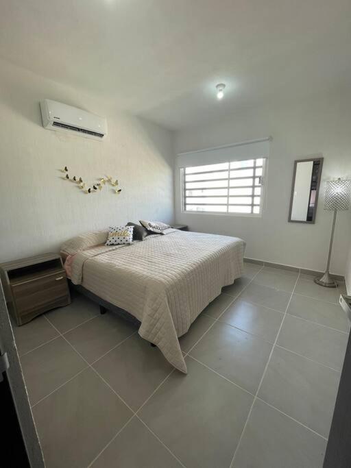 Three-Bedroom House photo 1